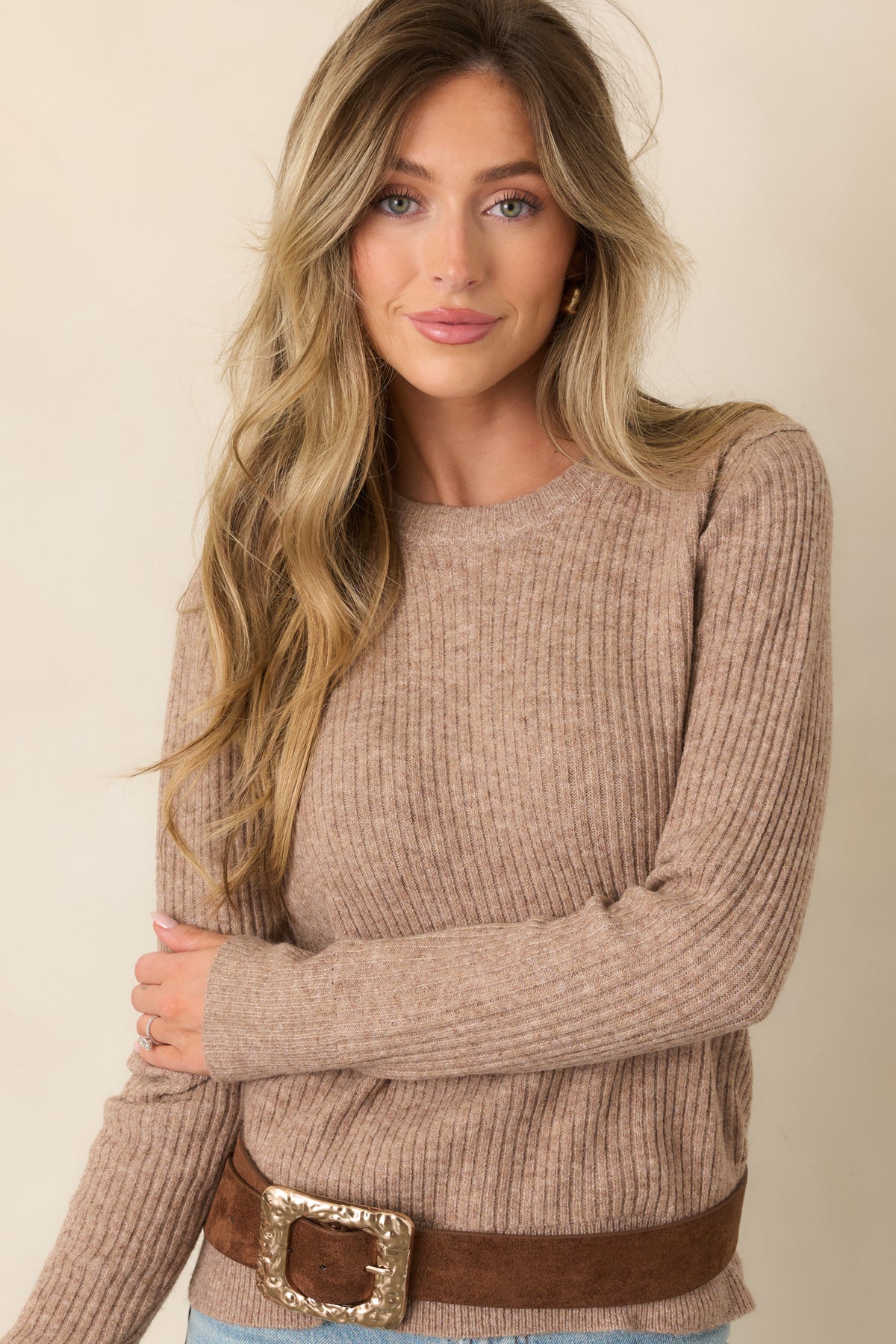 Vertical ribbing gives this mocha knit top subtle texture across its long-sleeve silhouette.