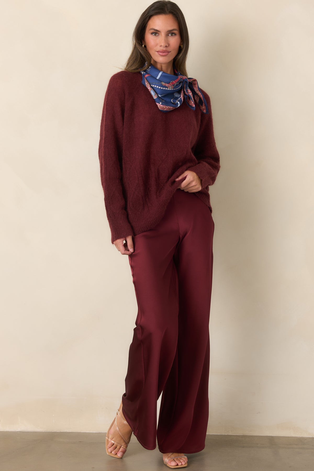 Fuzzy mohair-wool blend knit top featuring a ribbed mock neckline, relaxed raglan sleeves, and cable detailing.