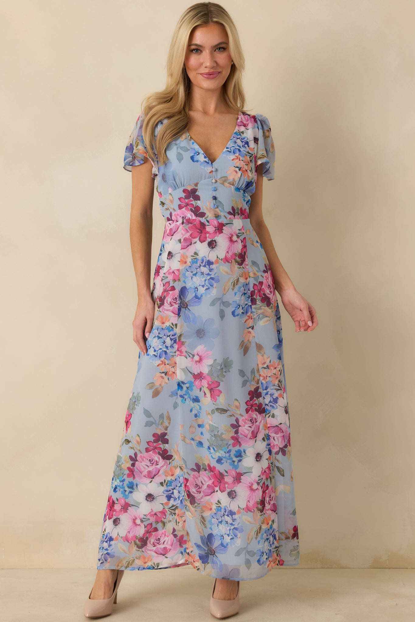 Multicolor blue maxi dress with a semi-sheer woven overlay, empire waist seam, and full-length lined skirt.