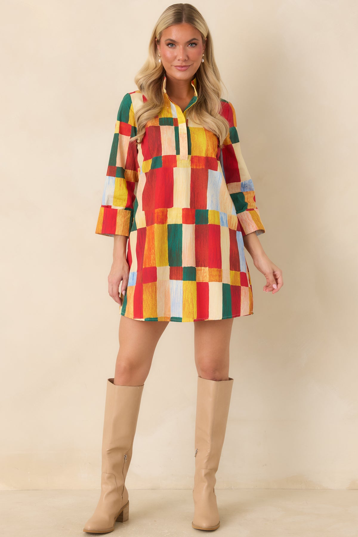 Multicolor geometric print mini dress featuring a straight, relaxed fit, standing collar, and three-quarter sleeves with wide cuffs.