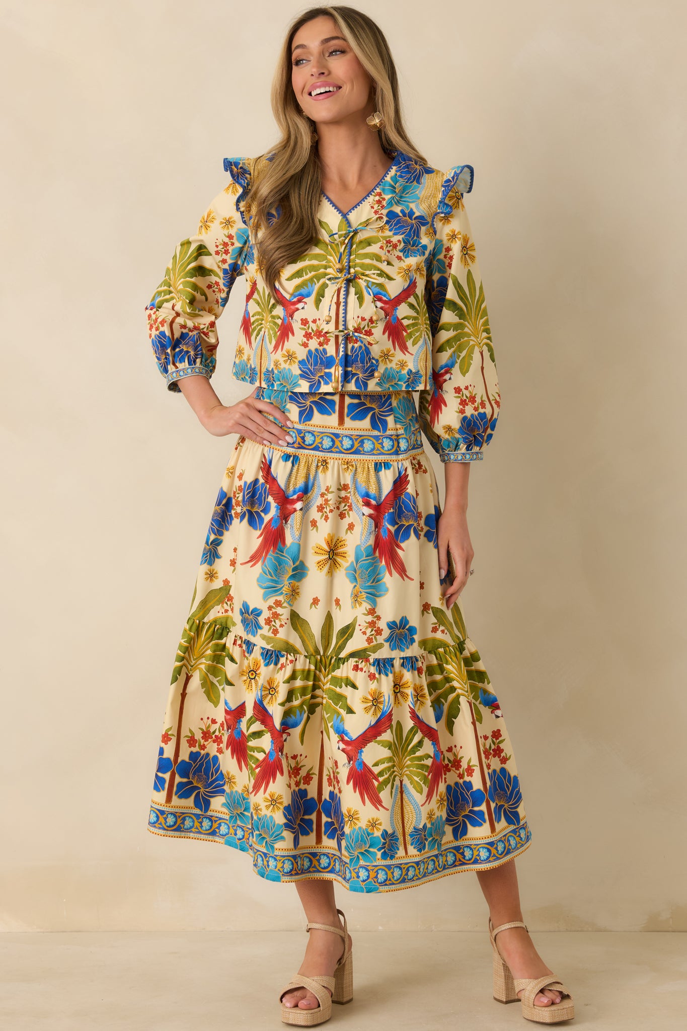 Front view of multicolored maxi skirt with high-rise waistband and tiered, flowy silhouette.