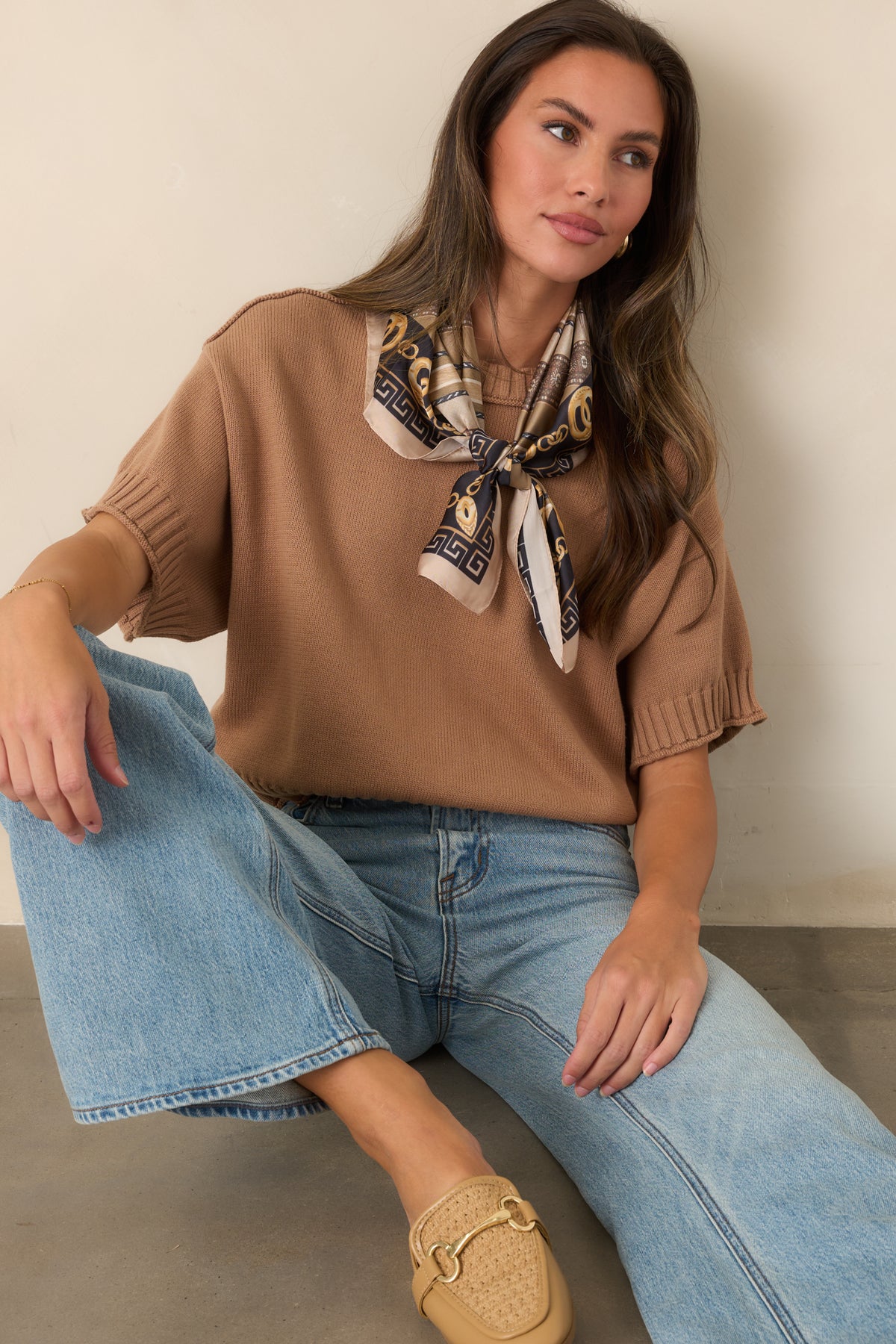 Multicolor square scarf showcases intricate scarf-print detailing with gold accents, decorative chains, and geometric patterns.