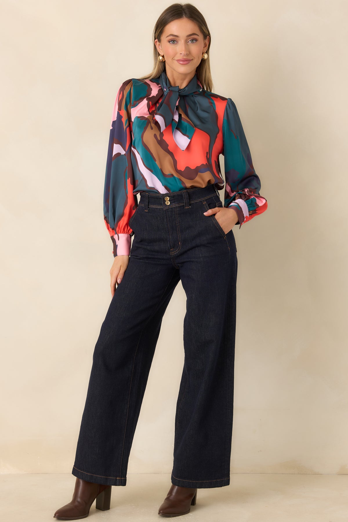 Study print top featuring sweeping teal, coral, pink, brown, camel, ivory, and purple shapes.