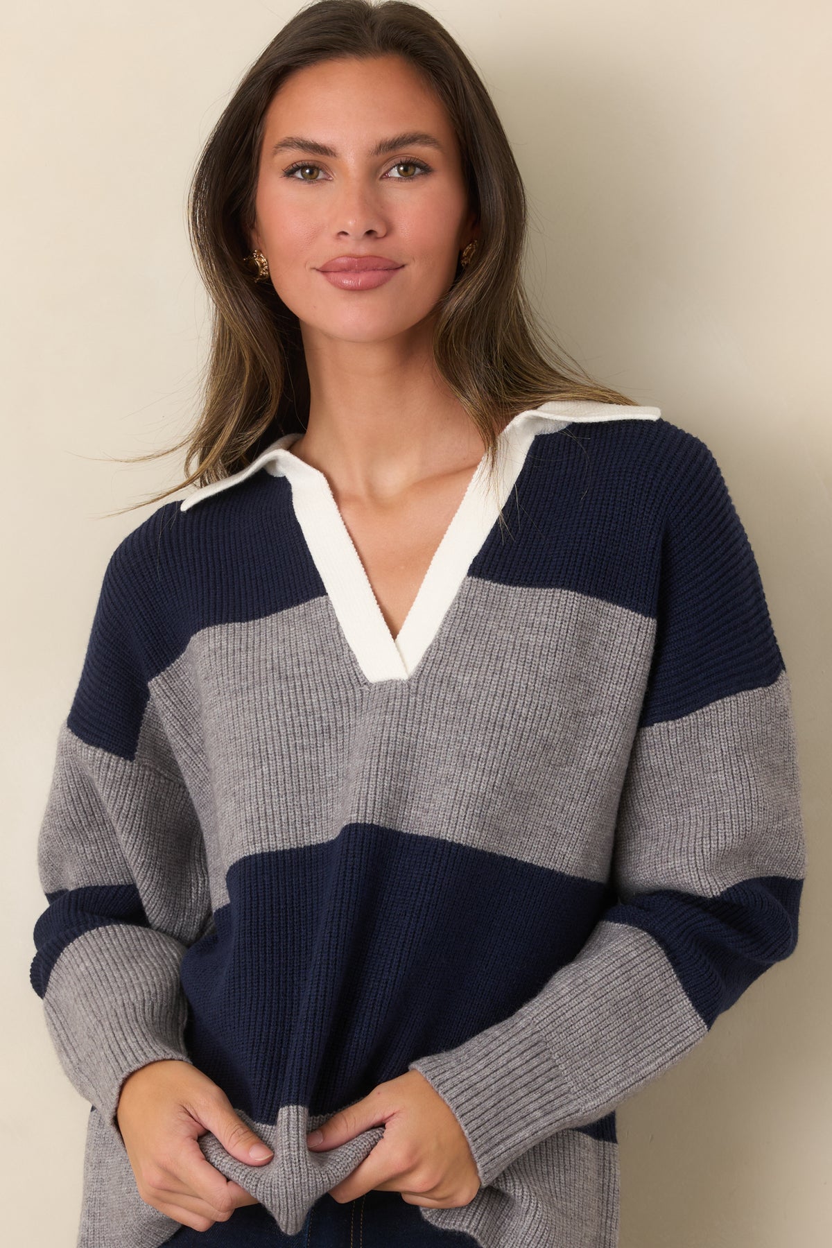 Navy and gray ribbed knit top highlighting the crisp ivory collar.