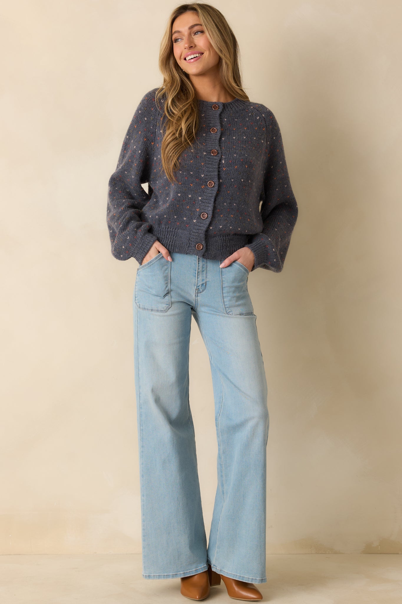 Navy heather knit button-up cardigan with a classic crew neckline and long sleeves.