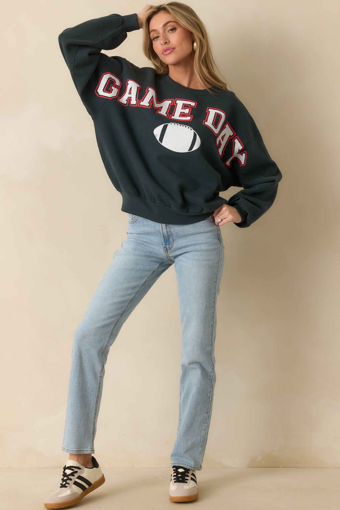 Relaxed-fit black sweatshirt showing its classic collegiate design and soft cotton feel.