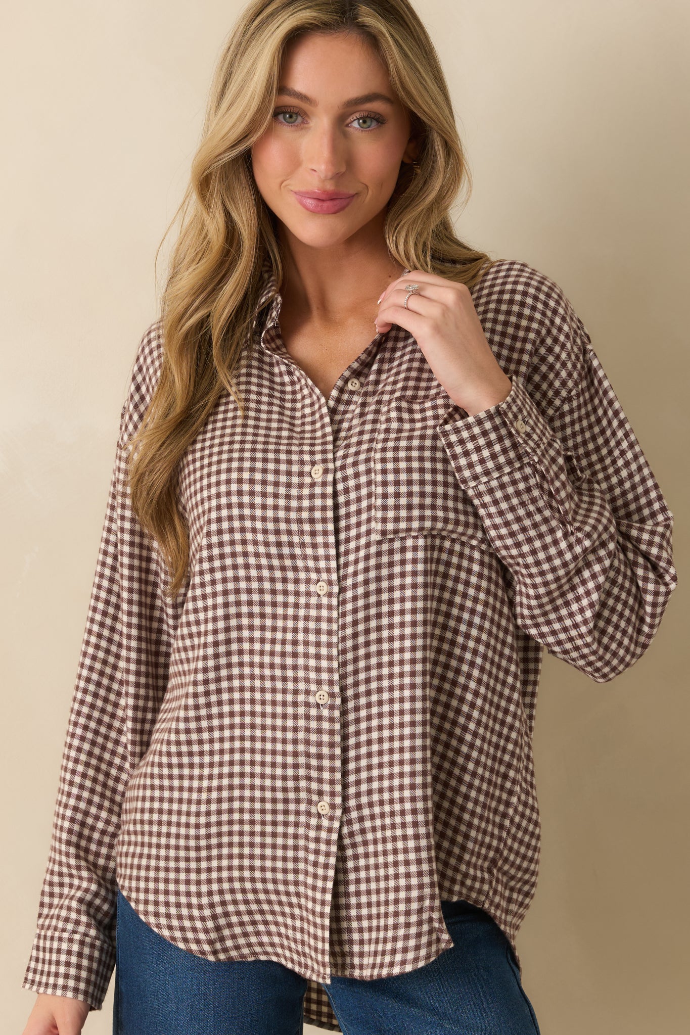 Cropped front view focusing on the collared neckline and detailed gingham pattern.