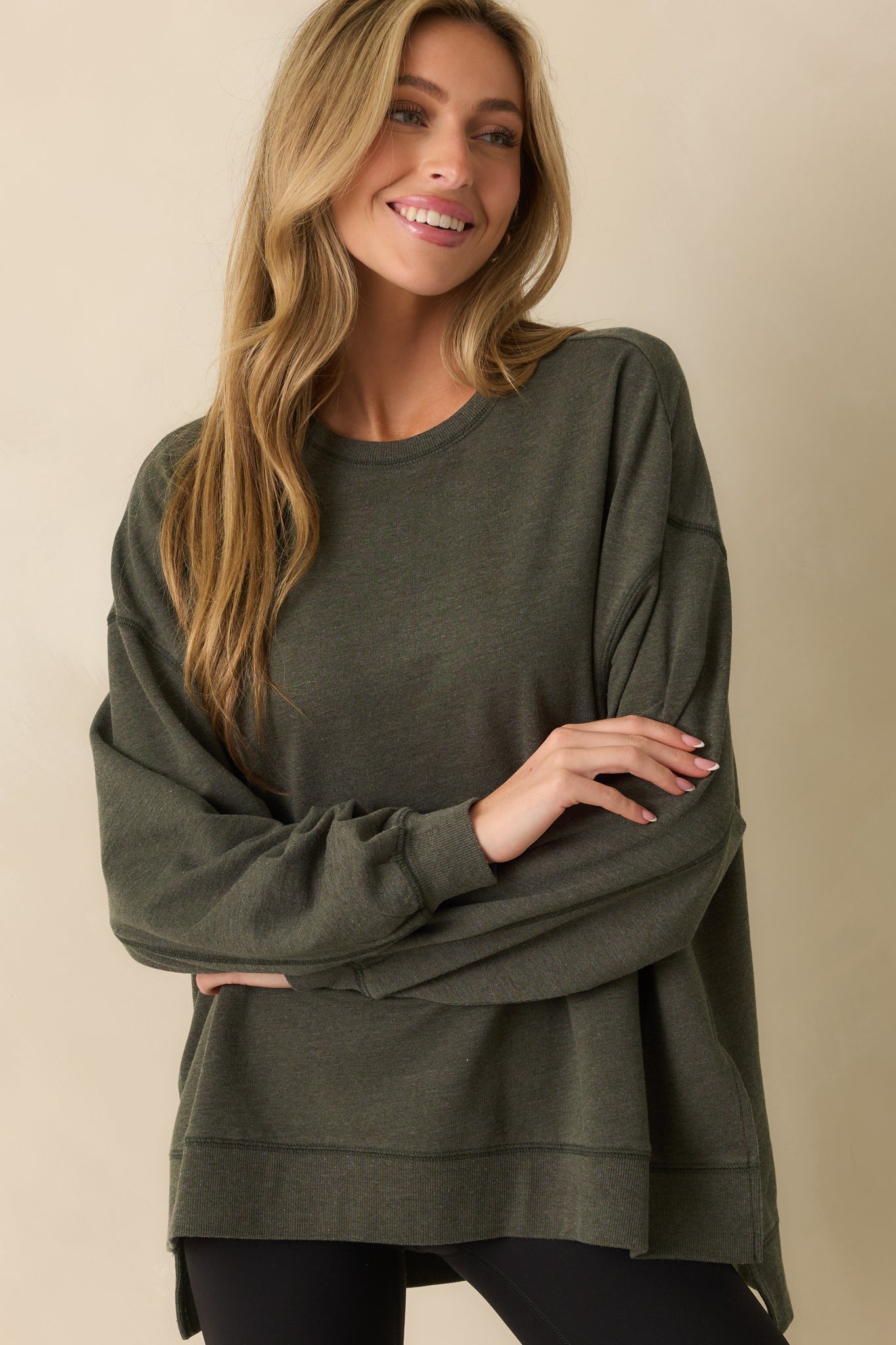 Cropped front view emphasizing the soft knit texture and easy layering silhouette.