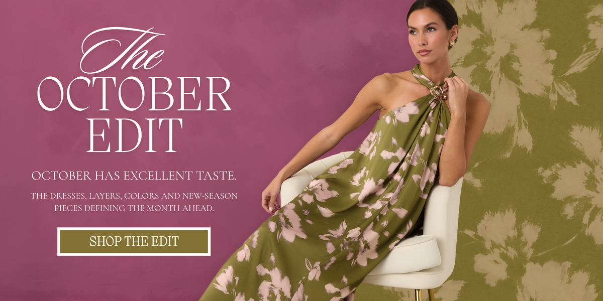 Model wearing an olive green floral halter dress seated in a white chair against a pink and green backdrop. Text reads ‘The October Edit. October Has Excellent Taste. Shop The Edit.’