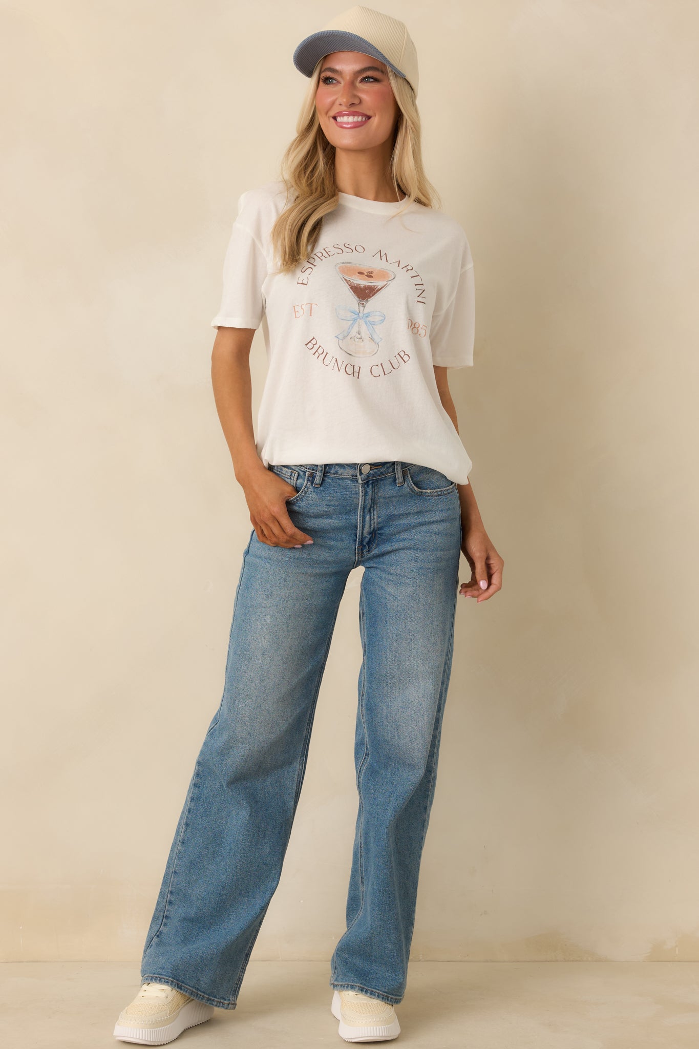 Off white short sleeve boyfriend tee designed with a crew neckline, relaxed fit, and coffee-themed graphic at the front.