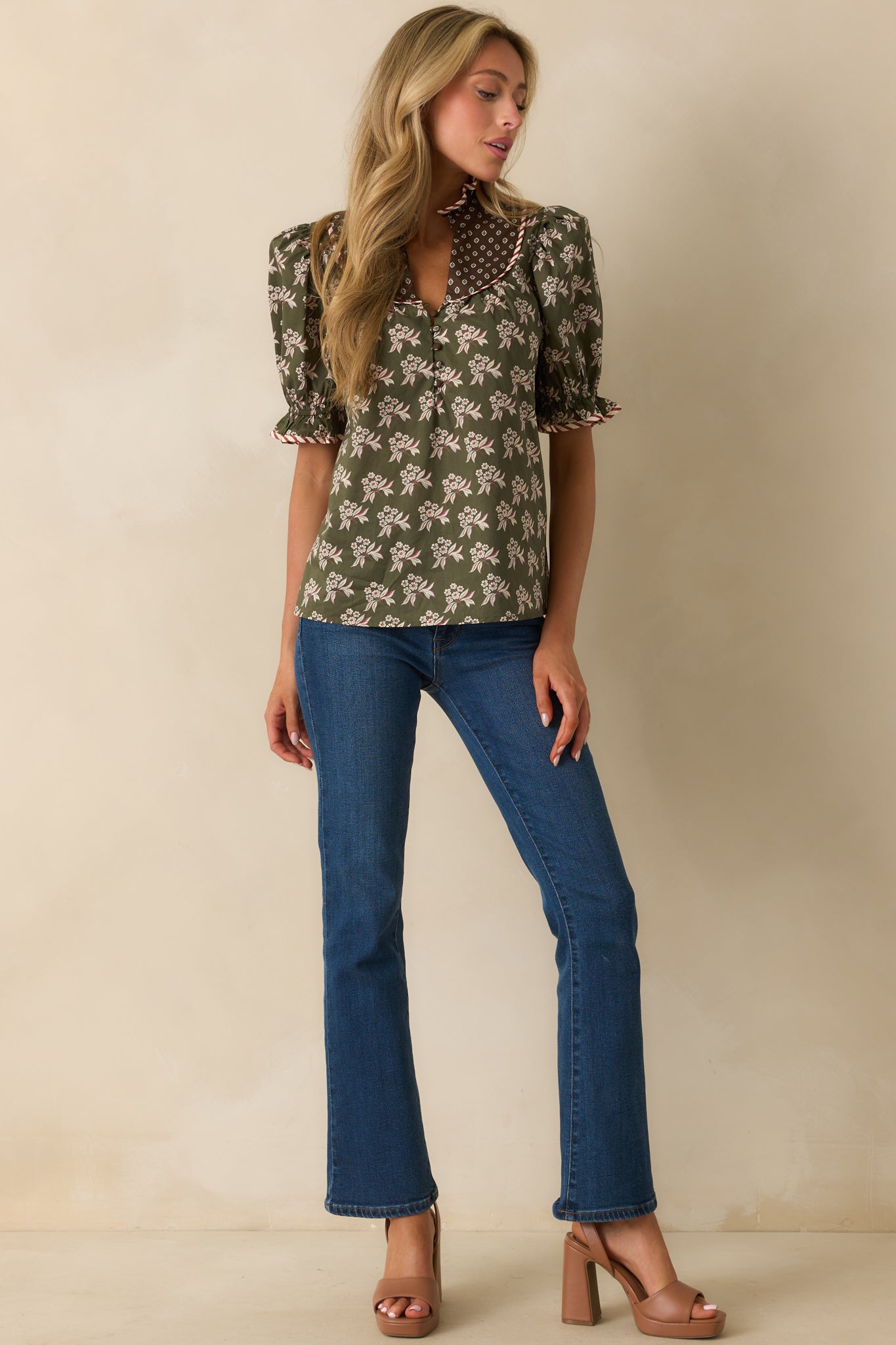Olive green floral top with a contrasting brown geometric yoke and split neckline.