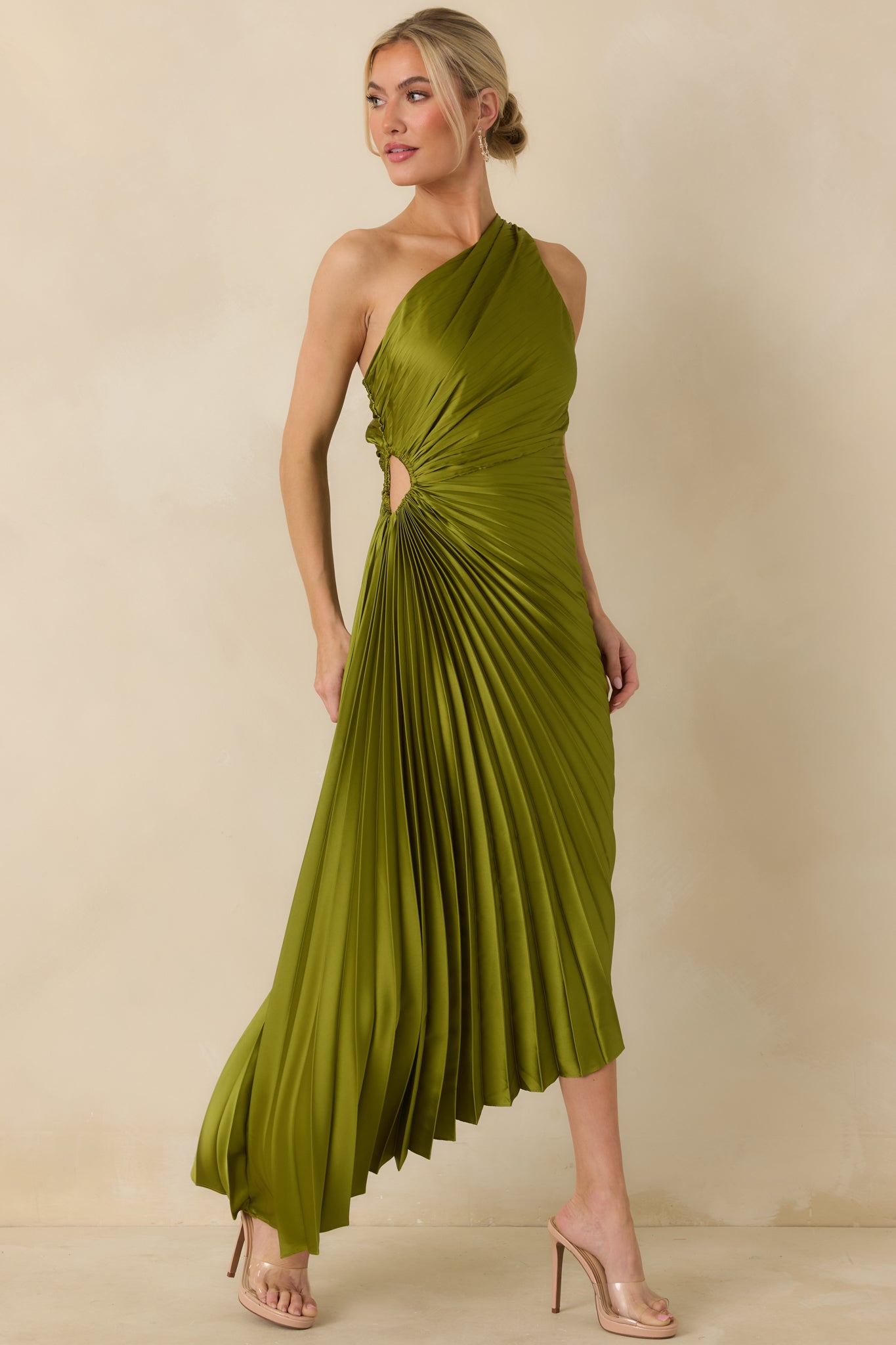 Olive green maxi dress with asymmetric one-shoulder neckline and flowing pleated skirt