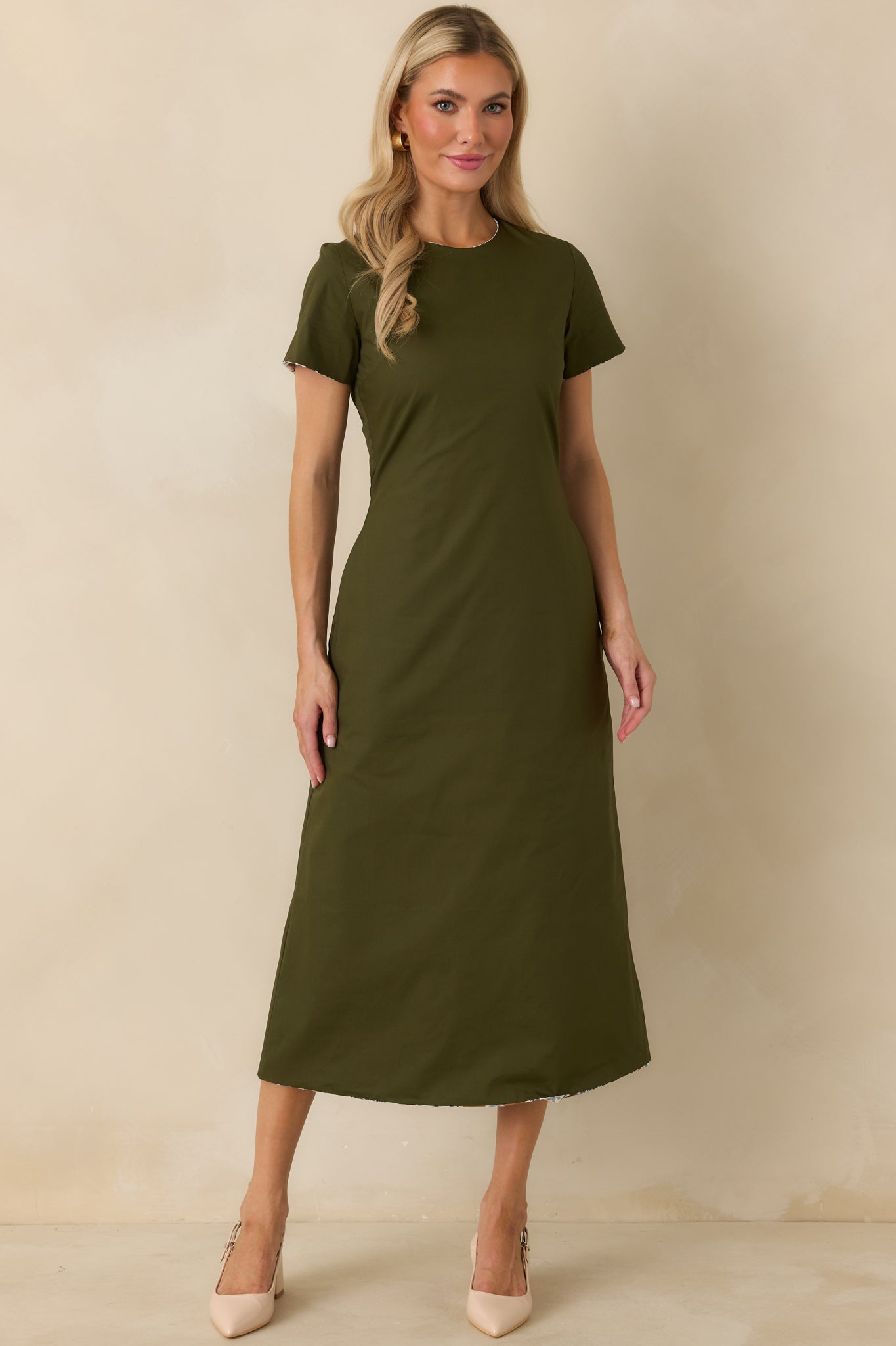 Olive green reversible dress featuring a clean A-line silhouette, short sleeves, and a smooth solid finish.