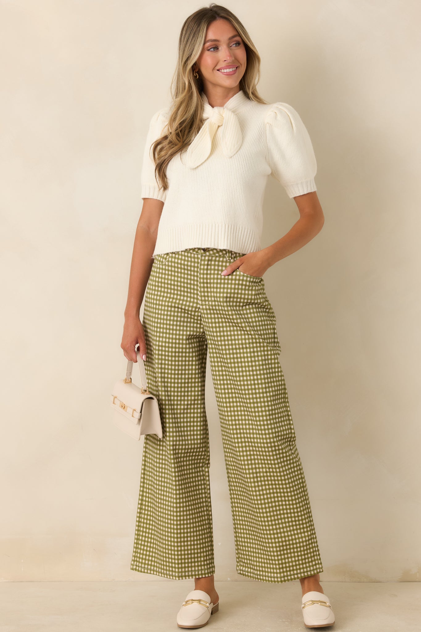 Olive and ivory gingham pants featuring a high-rise waist, relaxed wide leg silhouette, and comfortable stretch fabric.