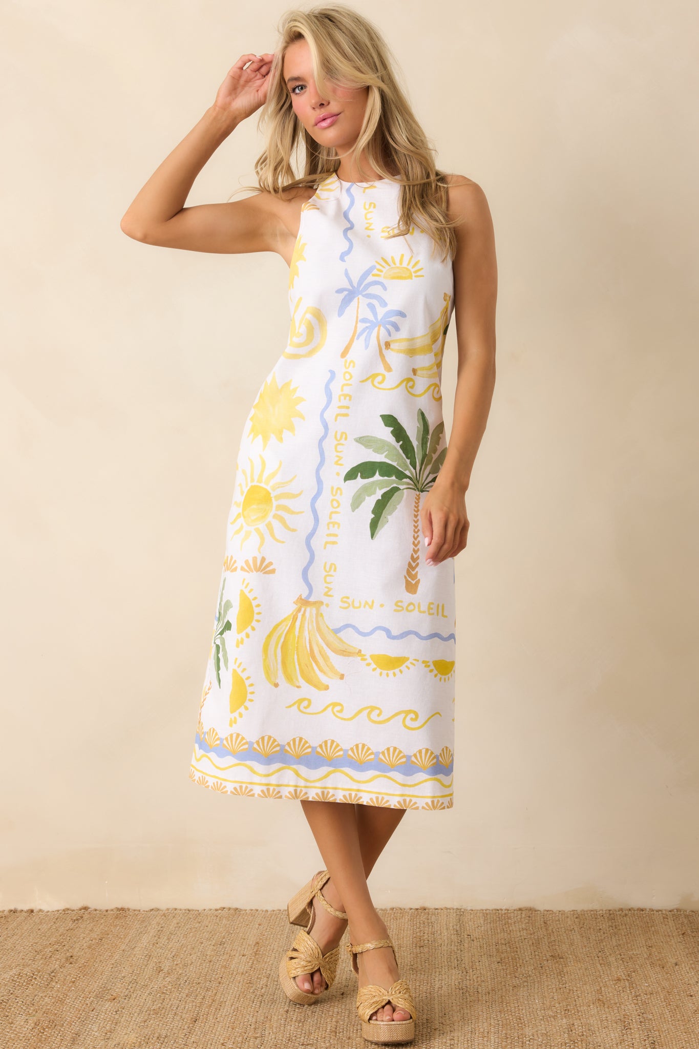 Relaxed linen-blend tank top showcasing a breezy fit with a clean square neckline and vibrant tropical motif for a fresh, summery feel.