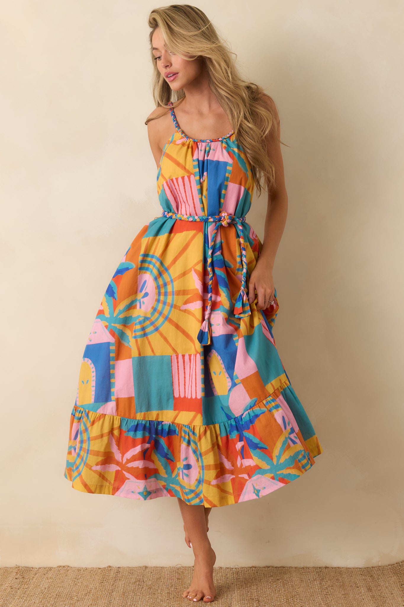 Lightweight linen blend midi dress showcasing a relaxed fit, removable braided waist tie, and flowing tiered construction.