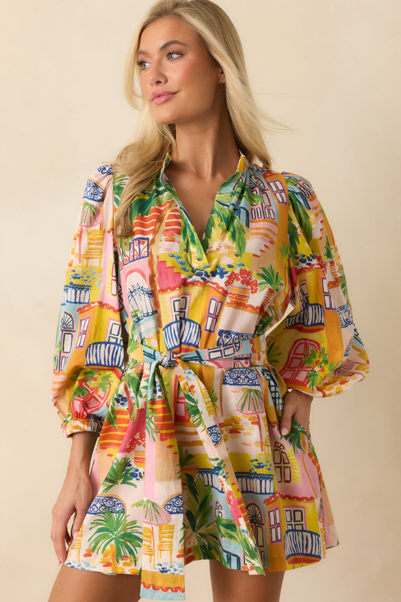 Cropped image highlighting the vibrant multi-color coastal artwork and relaxed silhouette through the bodice.