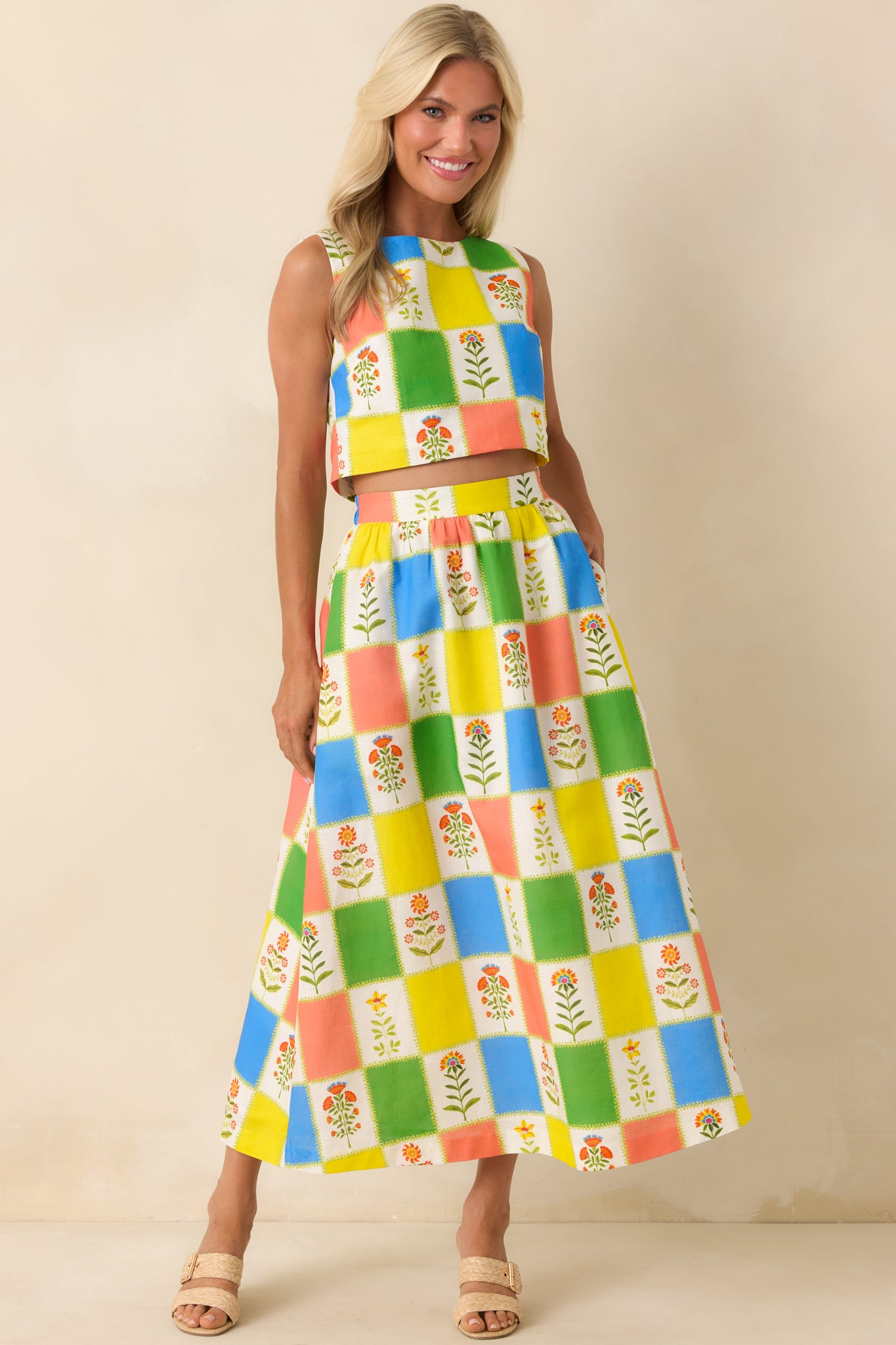 Flowing skirt in a colorful patchwork of florals and bold color blocks, designed with a breezy silhouette that moves easily with each step.