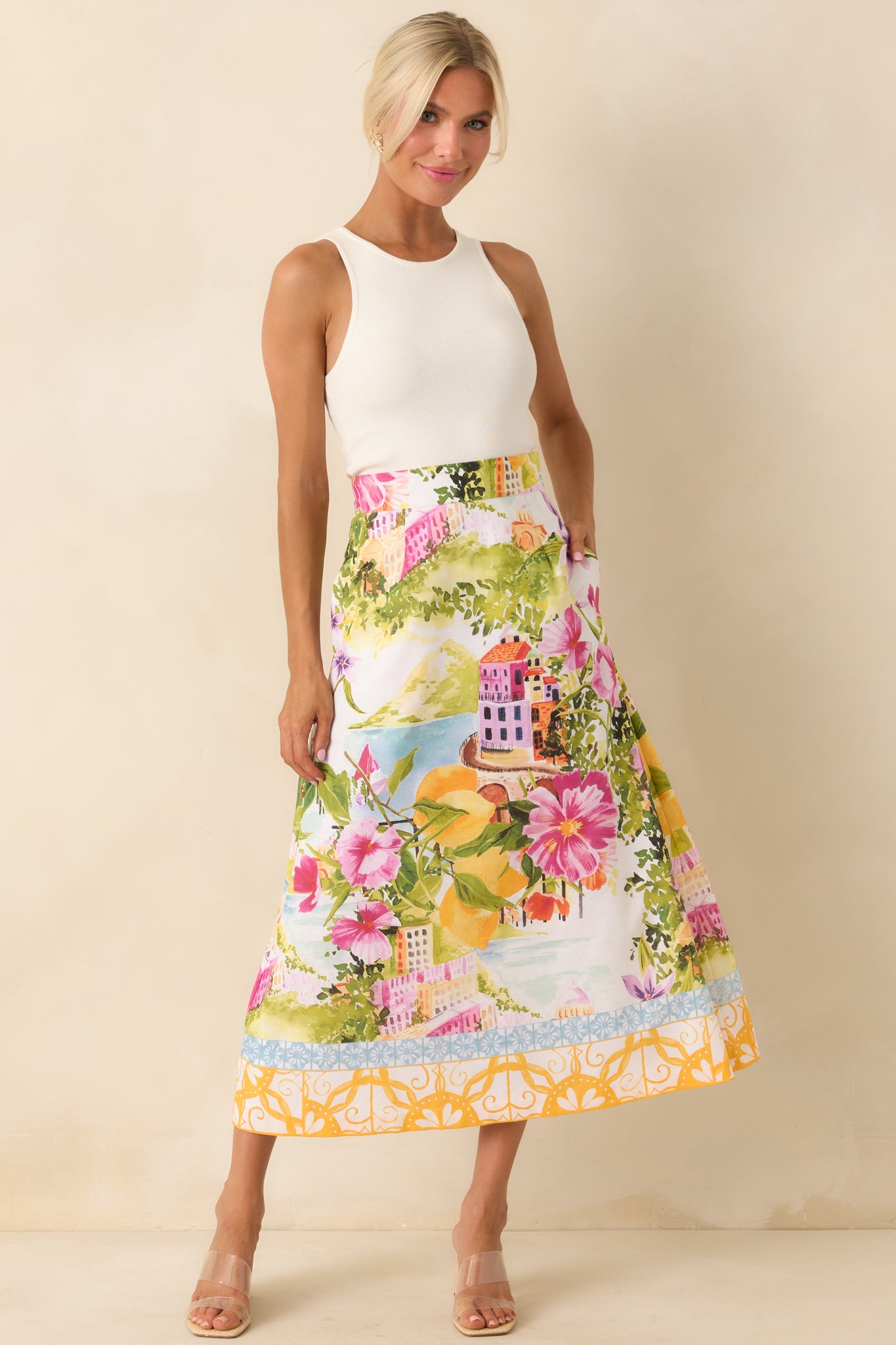 Lightweight skirt featuring a flattering high waist, easy A-line silhouette, and bold contrast trim at the hem.