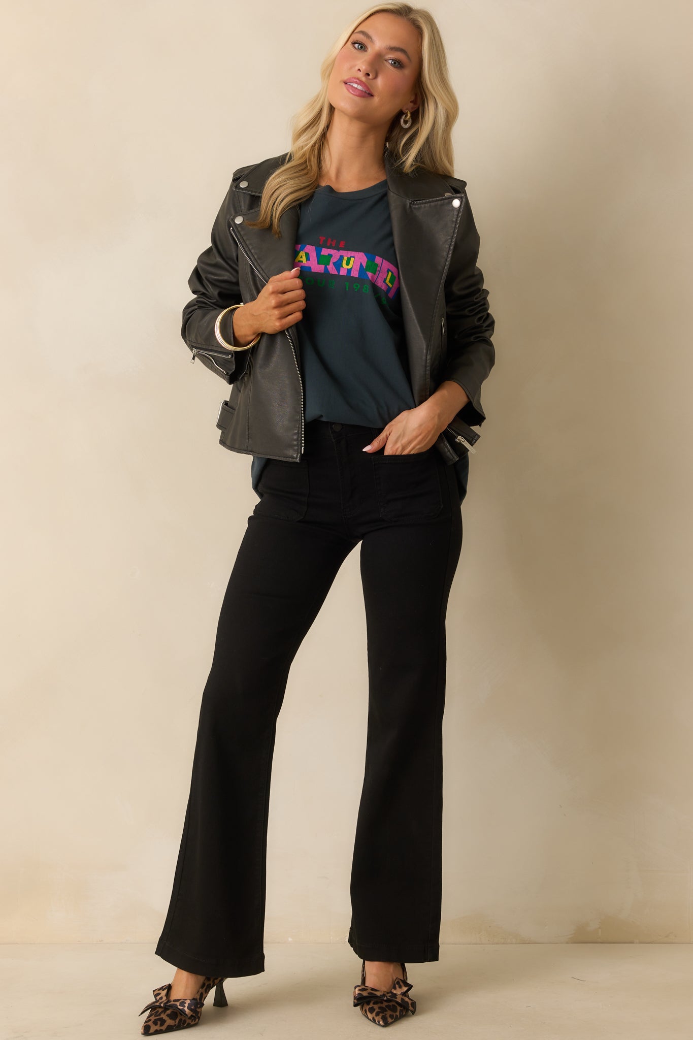 A full body photo emphasizing the crew neckline and loose silhouette of the tee.