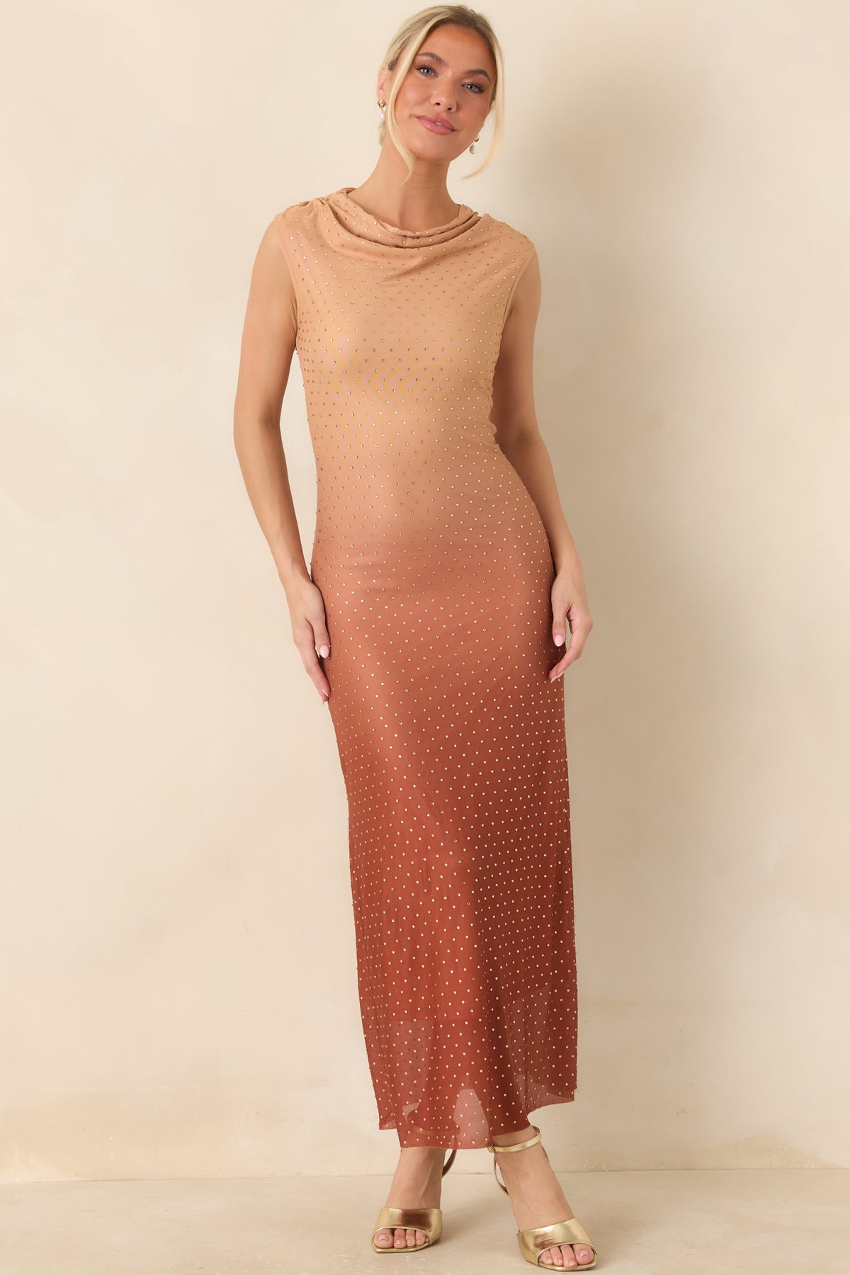 Sleeveless ombré maxi dress fading from peachy blush to rich rust with shimmering rhinestone embellishments.