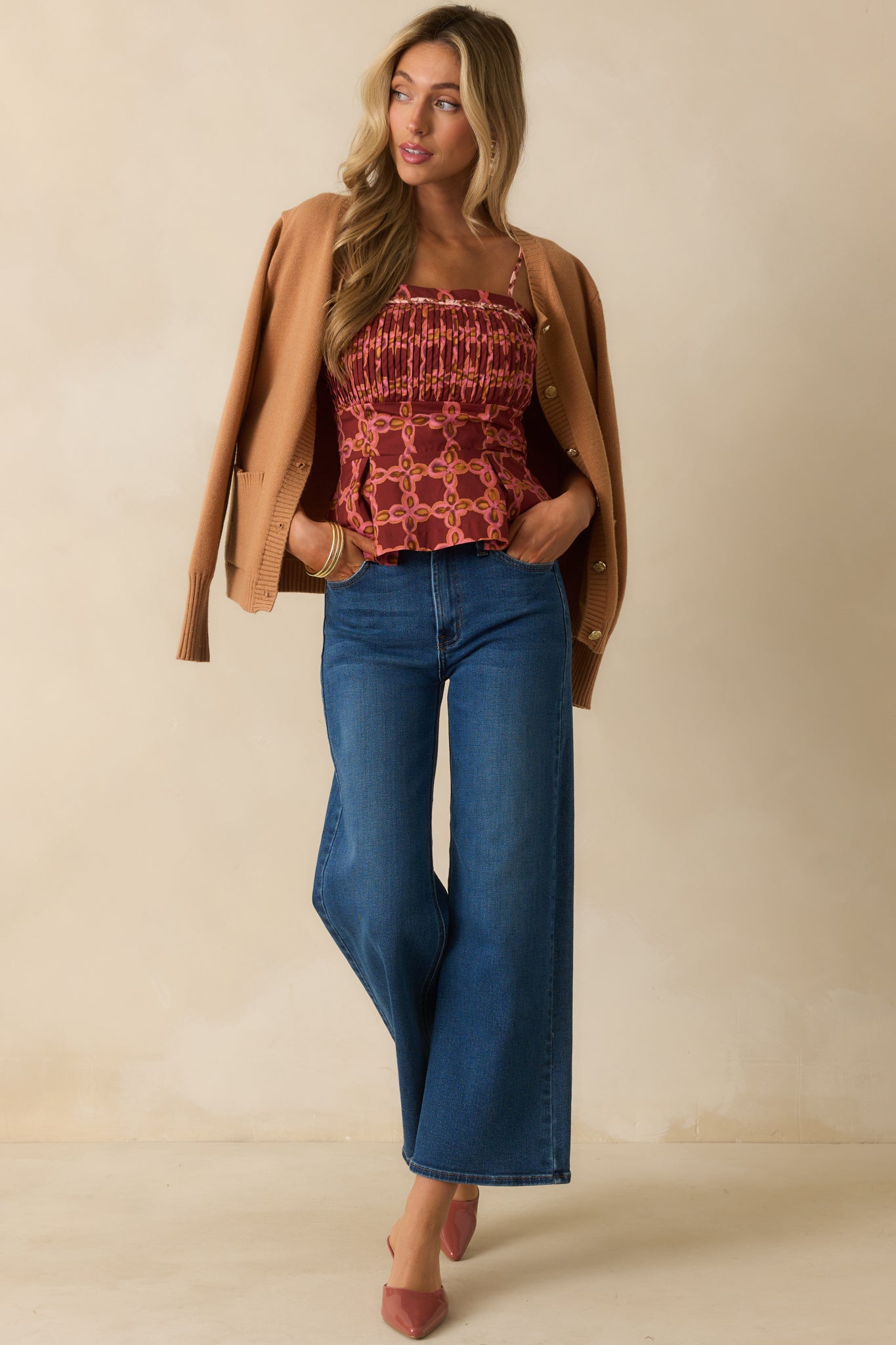 Pink cotton top with a multicolor geometric print and braided trim square neckline.