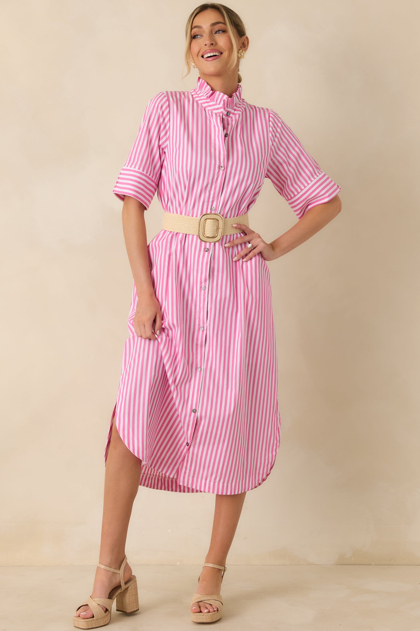 Full body front view of the pink striped shirt dress showing the button-front closure and softly ruffled collar.