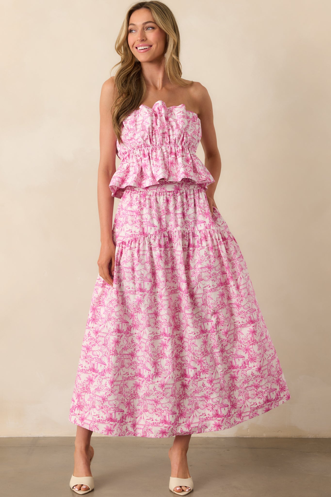 Front-facing full body image of pink toile print skirt with a soft drop waist and flowing shape.