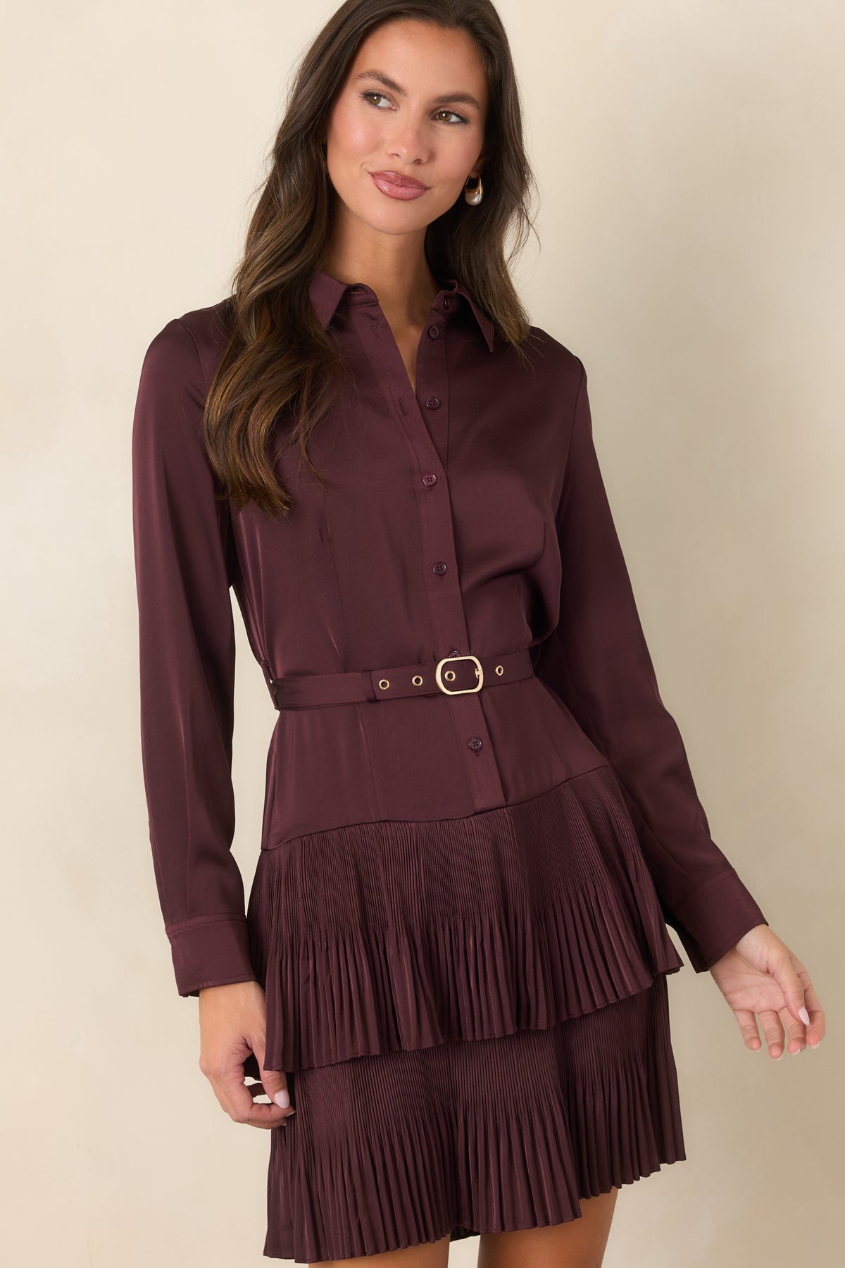 Plum mini dress featuring long sleeves finished with neat buttoned cuffs.