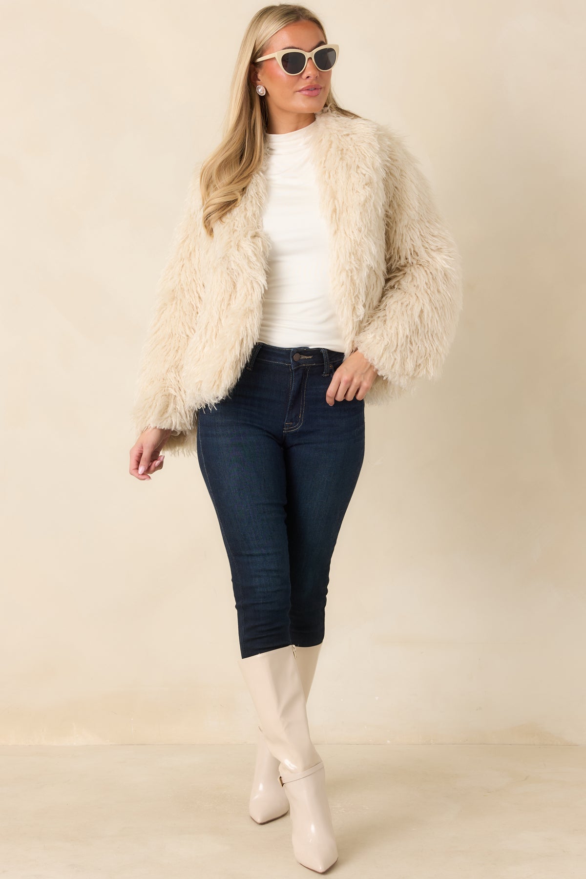 Plush jacket with dimensional wavy fibers, an open front, and a casually relaxed silhouette.