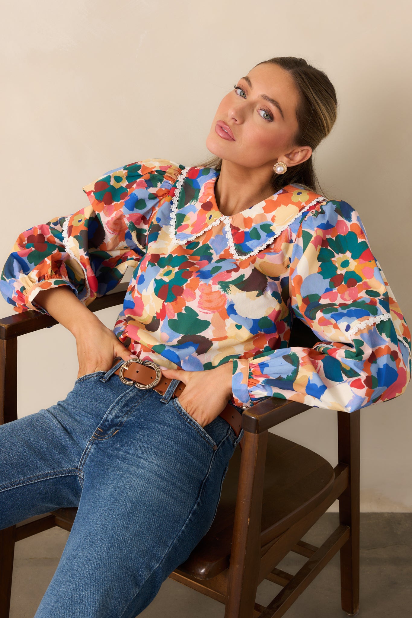 Cropped look highlighting the long puff sleeves and functional button cuffs.