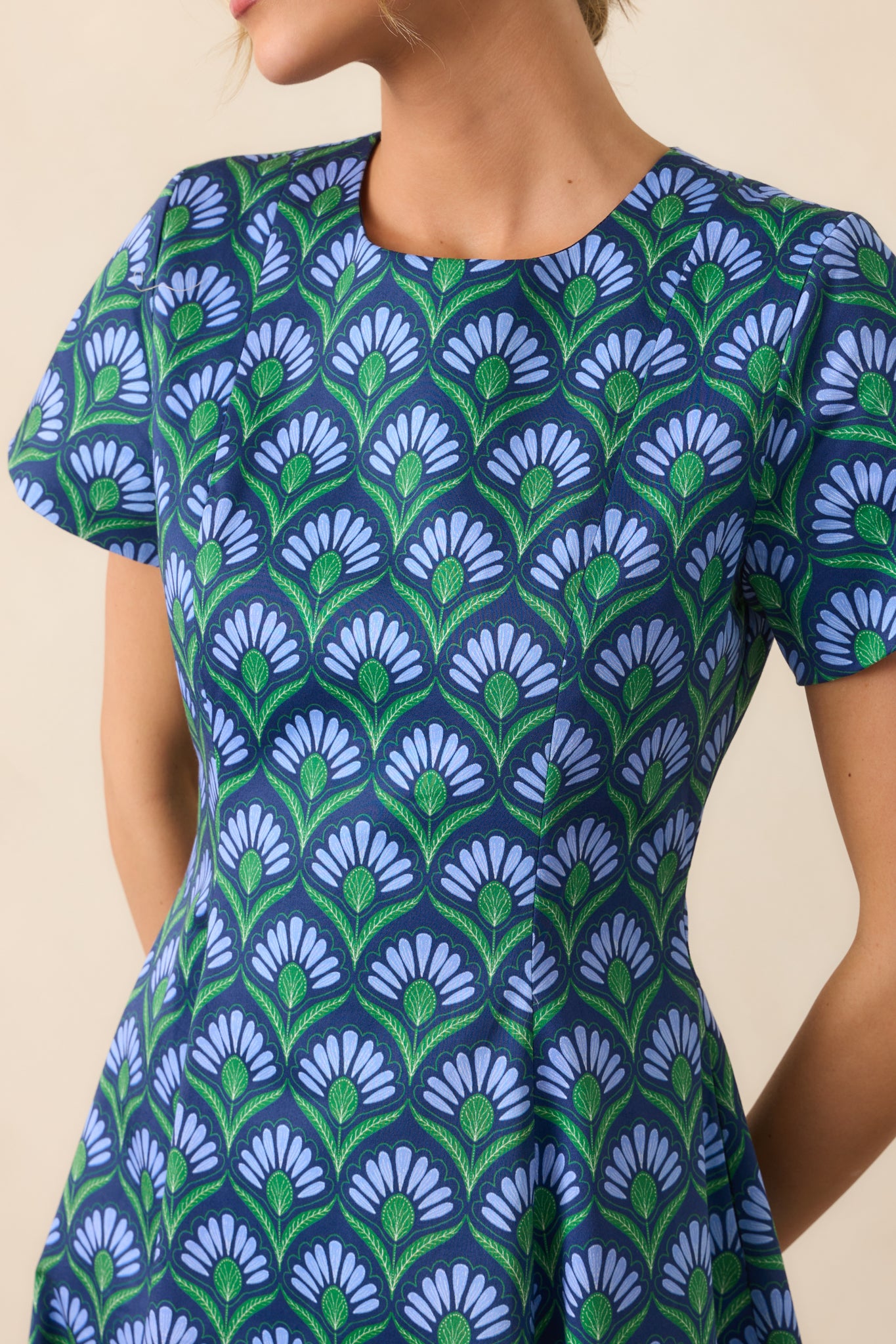 Close-up of the geometric print panel and fabric texture at the bodice.