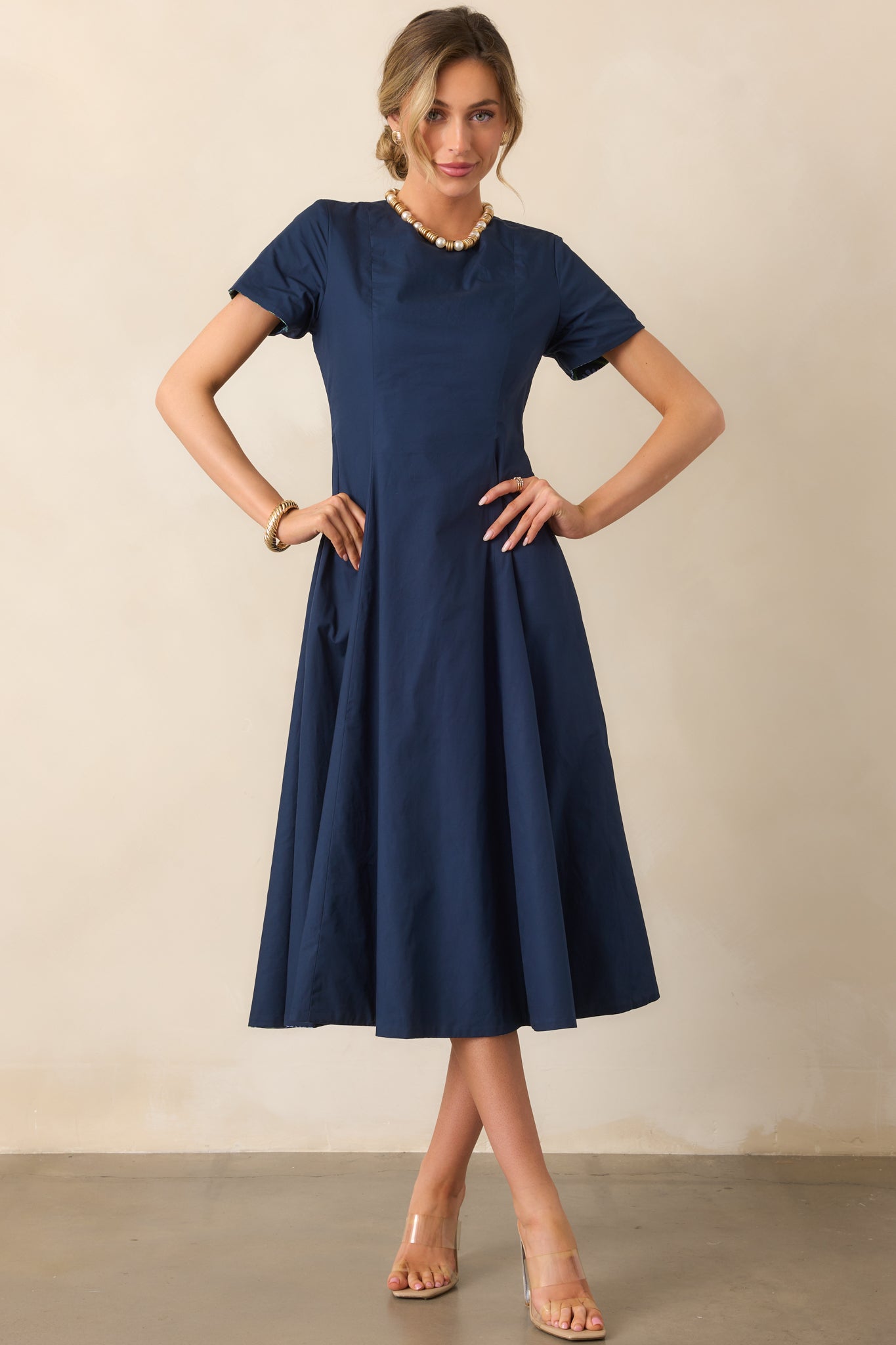 Right side showing the solid midnight blue panel with functional side seam pocket.