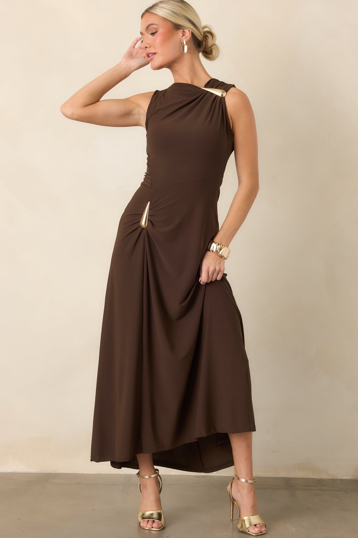 Pull-on maxi dress showcasing its sleek fitted bodice, dramatic draping, gathered hip, and gently flared skirt.