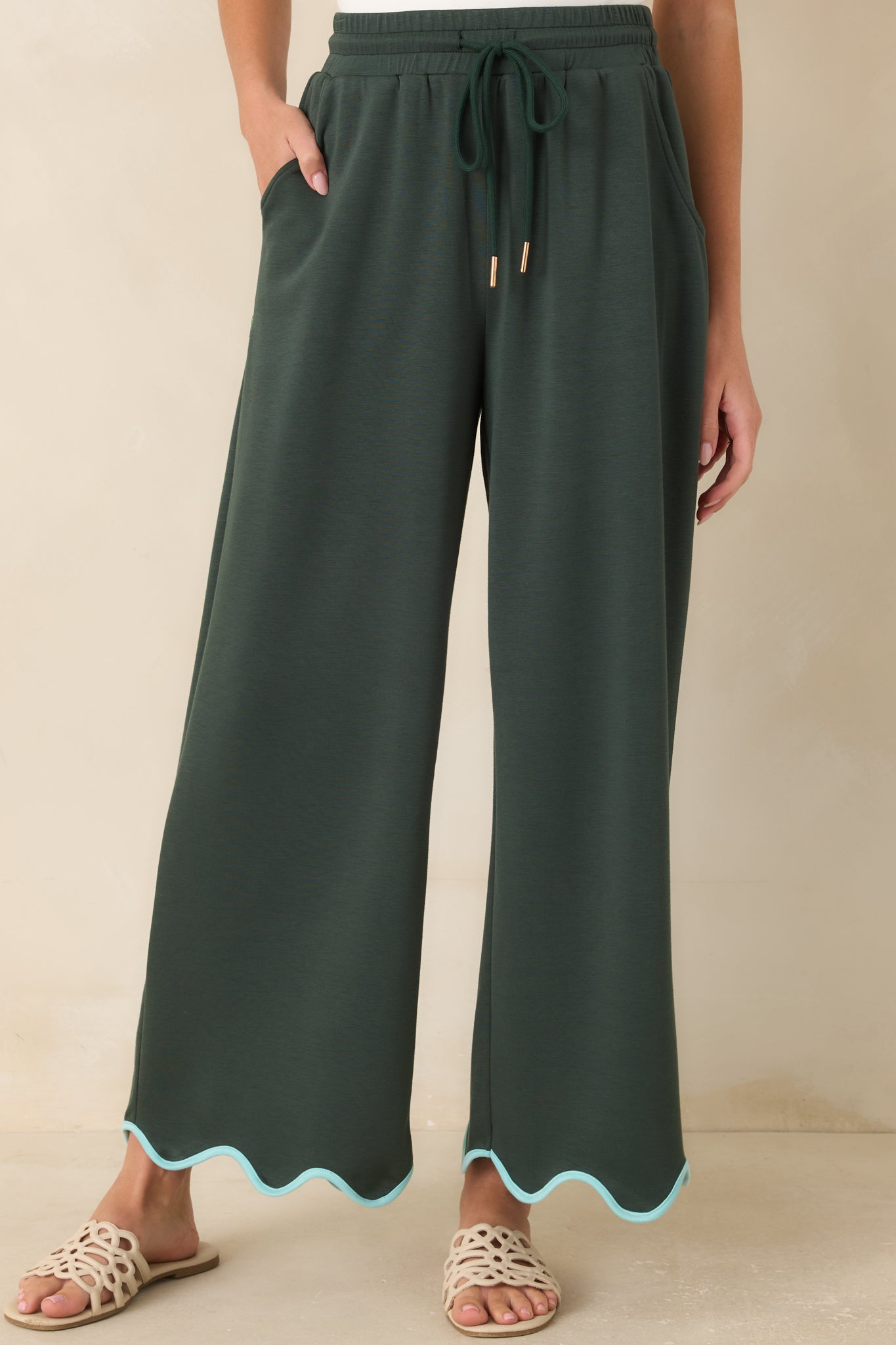 Gold-tone cord ends add a polished touch to the comfortable pull-on waistband.
