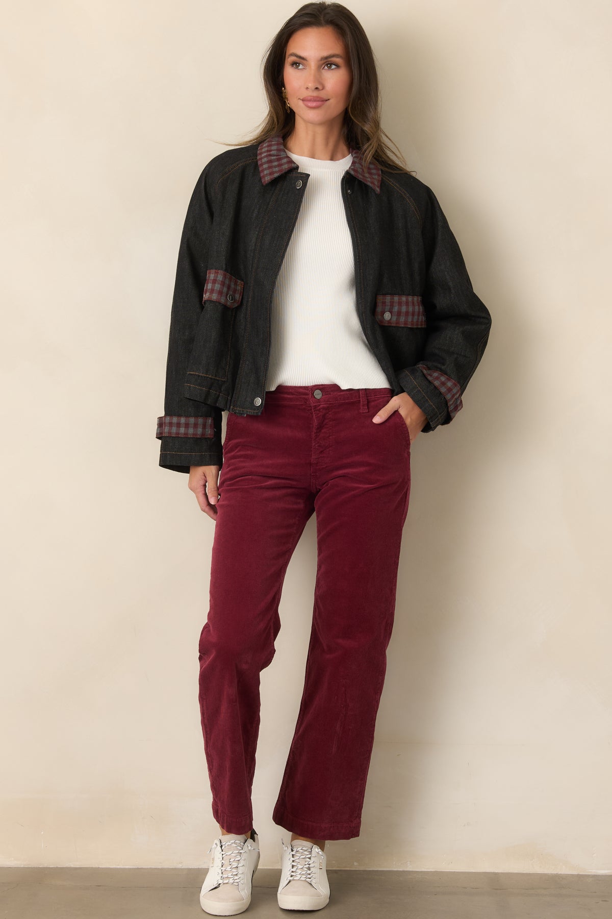 Quilted denim jacket featuring a relaxed silhouette, oversized front pockets, gingham trim, and insulated construction