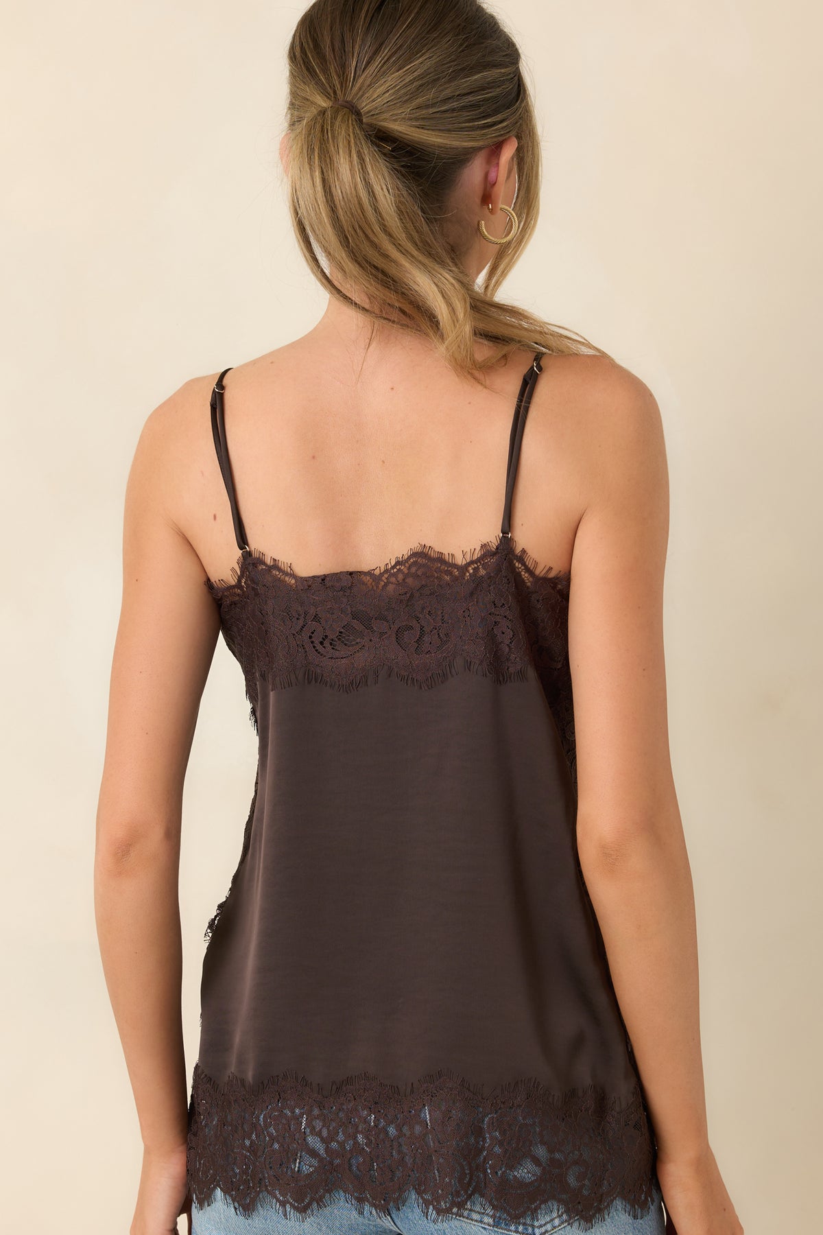 Rear view of the cocoa brown satin camisole with slim adjustable straps and a relaxed shape.