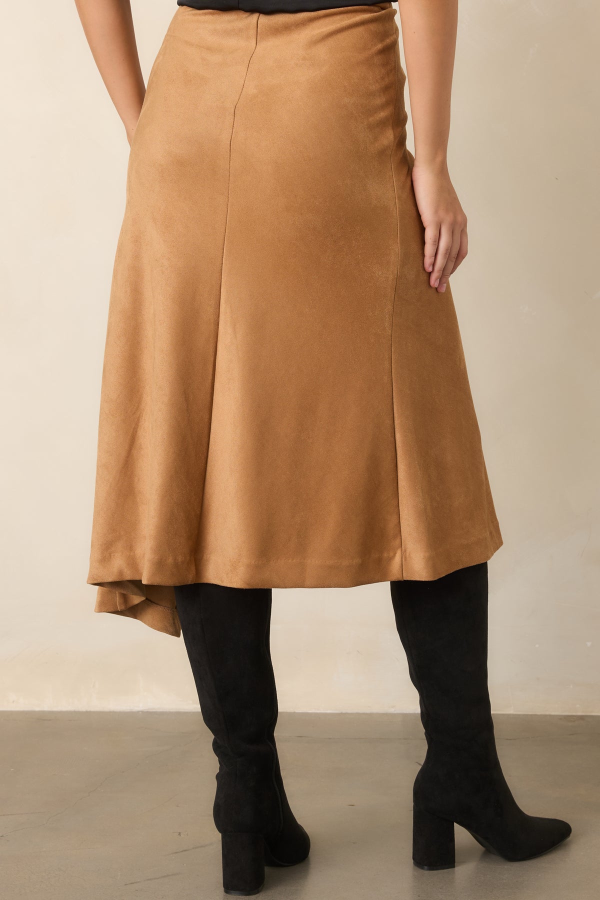 Rear view of the faux suede skirt showing the clean streamlined back and high-rise waist.