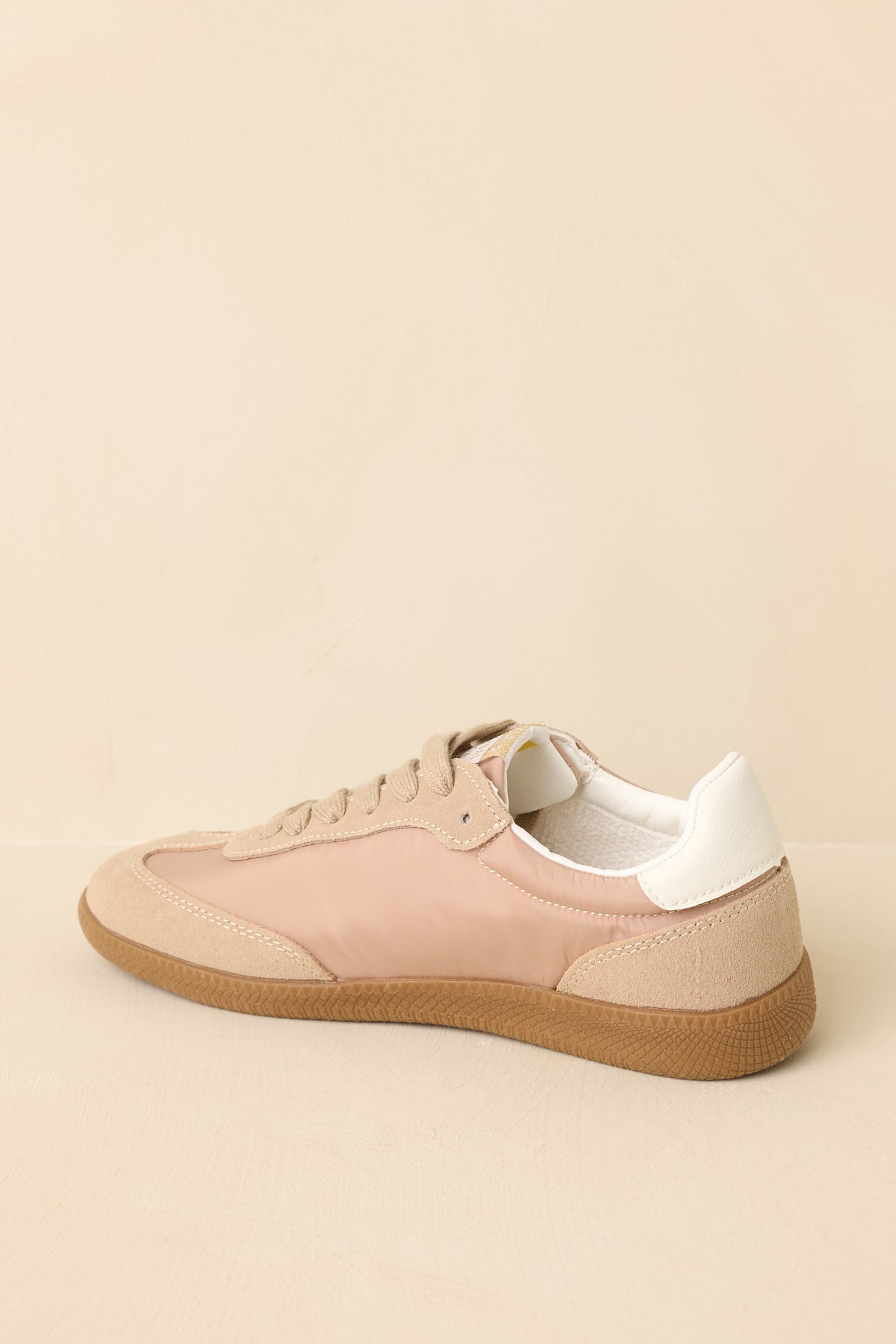 Rear view highlighting the heel structure, outsole grip, and overall sneaker finish.