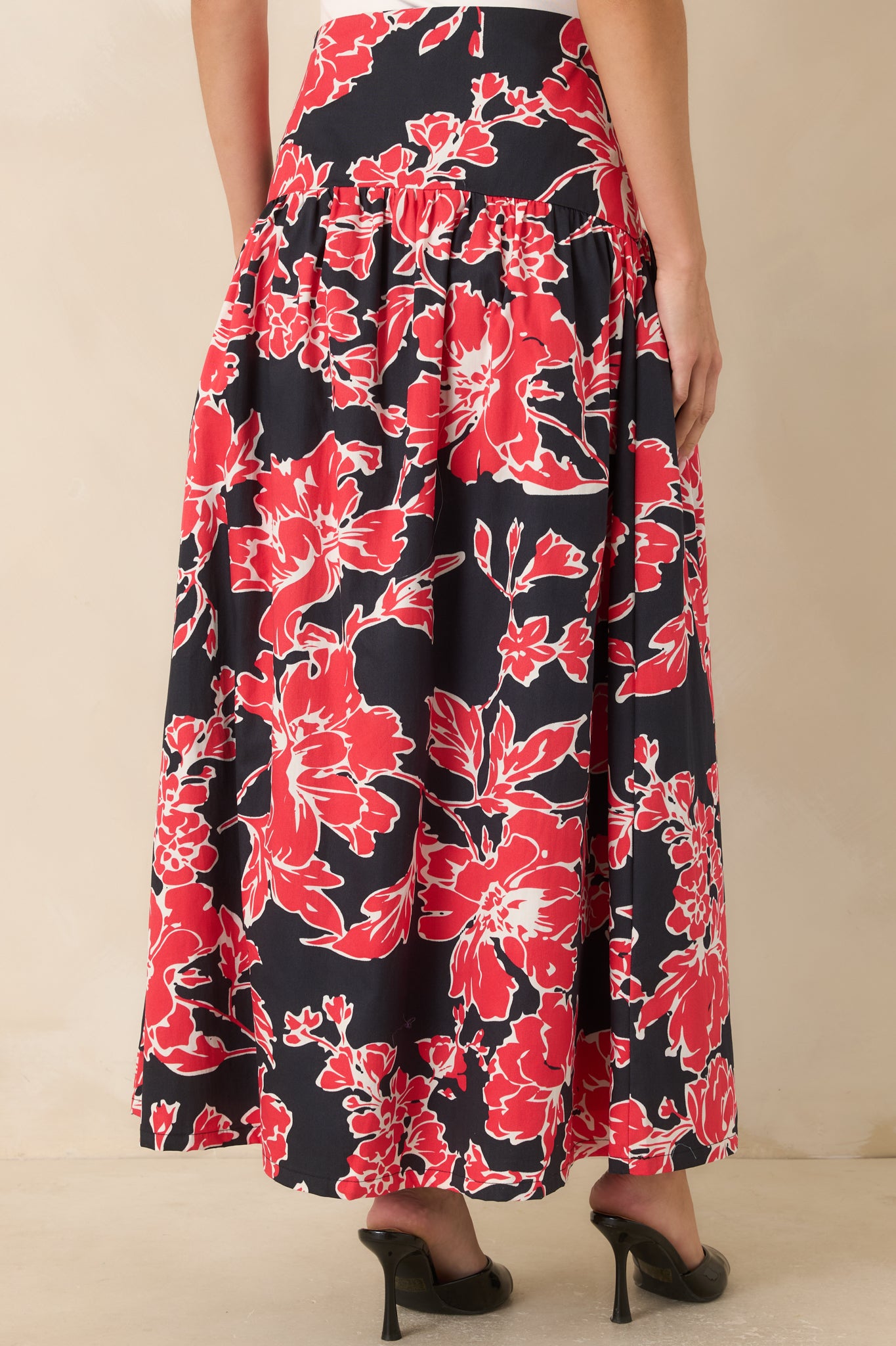 Rear view of the cotton skirt showcasing the flowing silhouette and clean finished design.