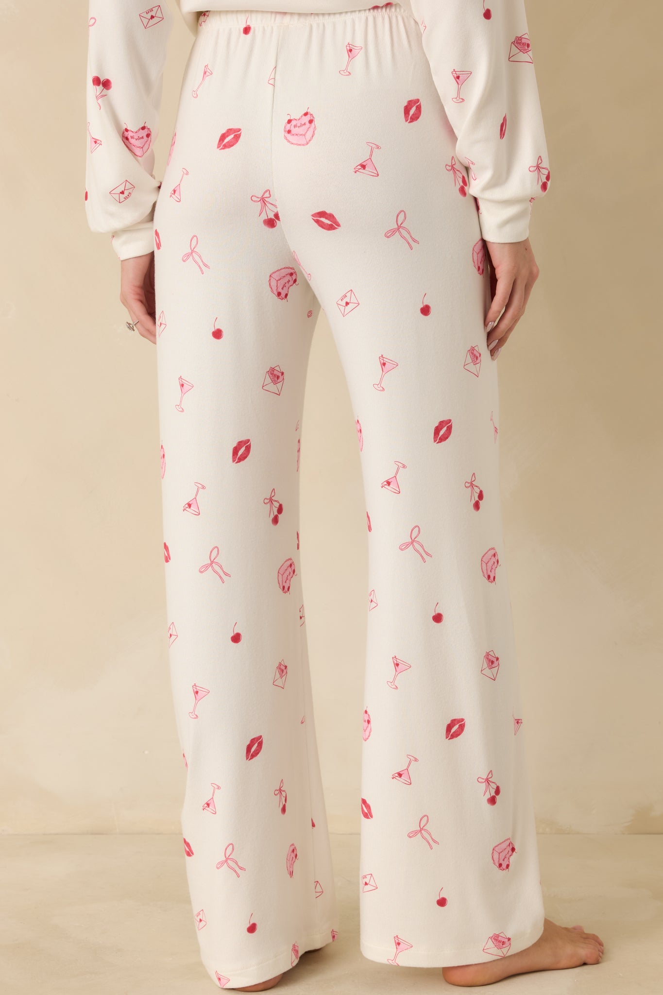 Rear view of ivory pajama pants showing the straight-leg silhouette and relaxed fit