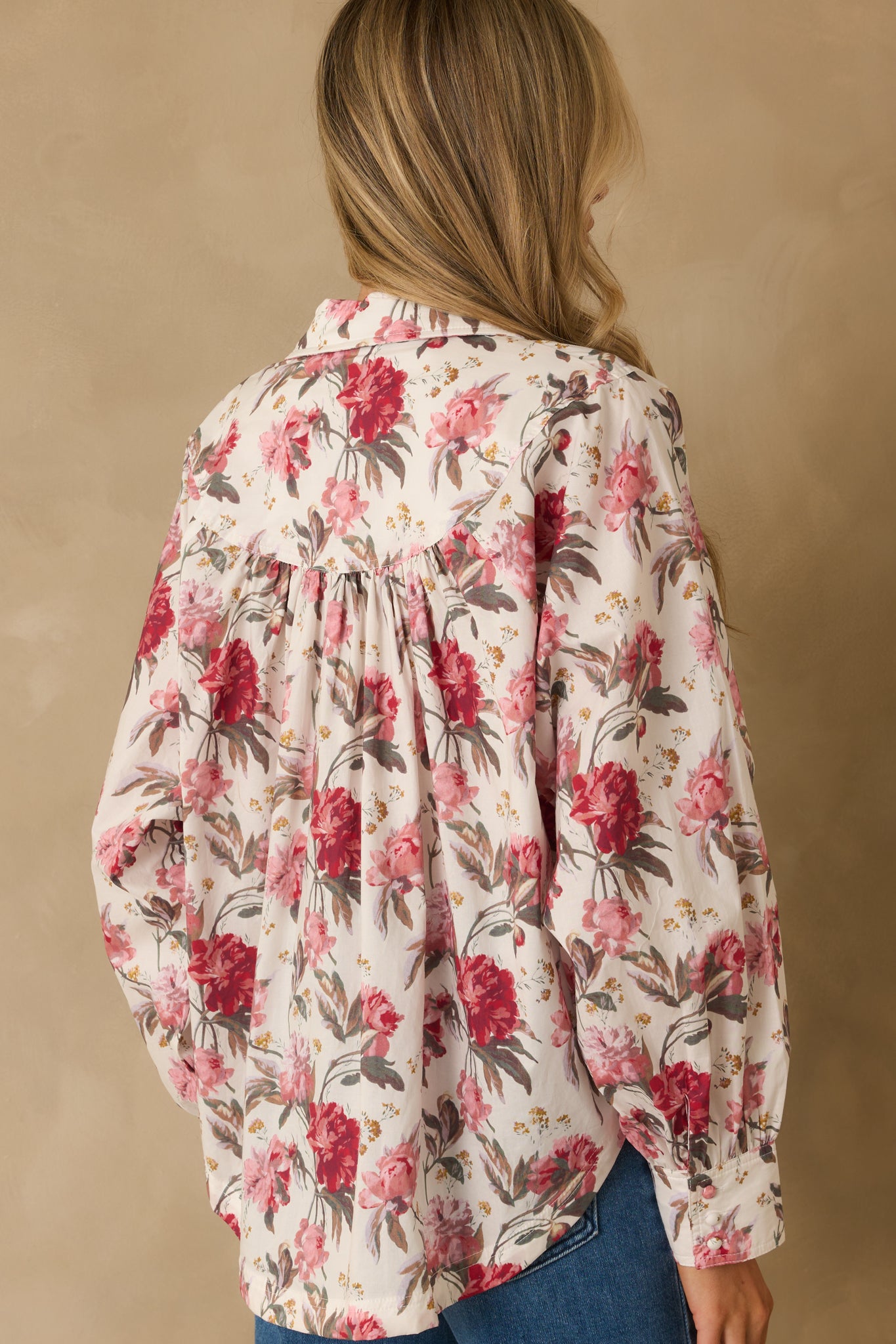 Rear view of the top showing the relaxed fit and multicolor print continuing across the back.