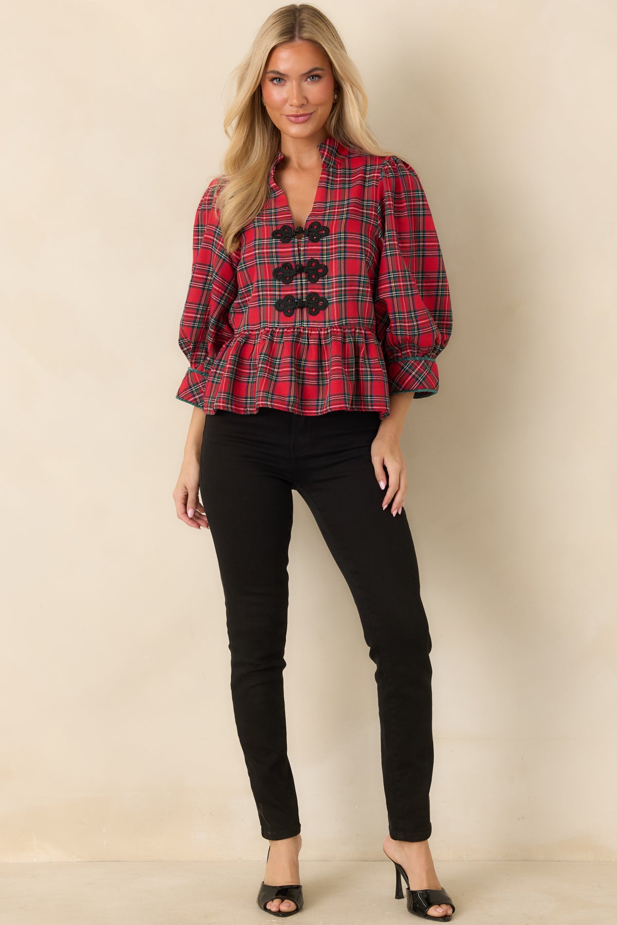 Plaid blouse with fine yellow and ivory lines, a split neckline, three-quarter sleeves, and a gathered waist.