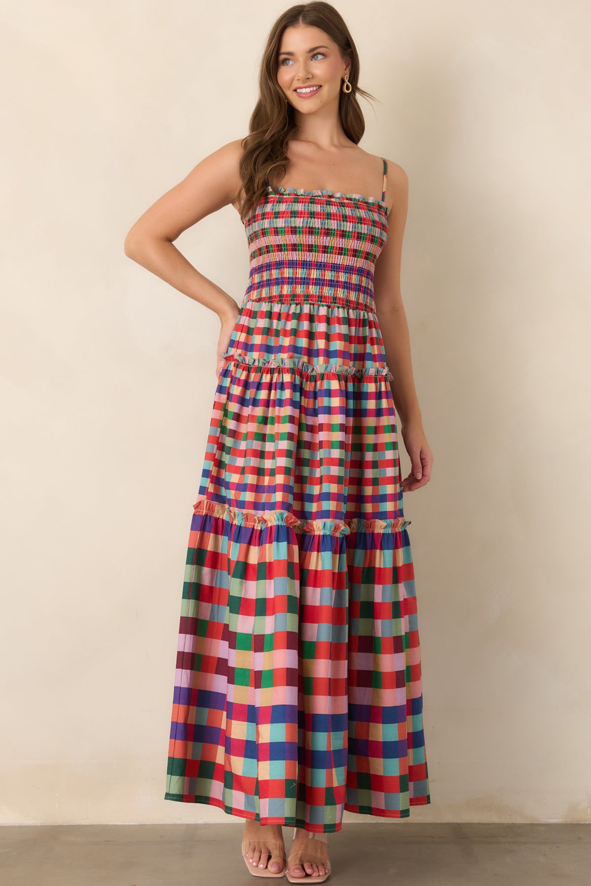 Red plaid dress accented with green, pink, blue, orange, and aqua tones.
