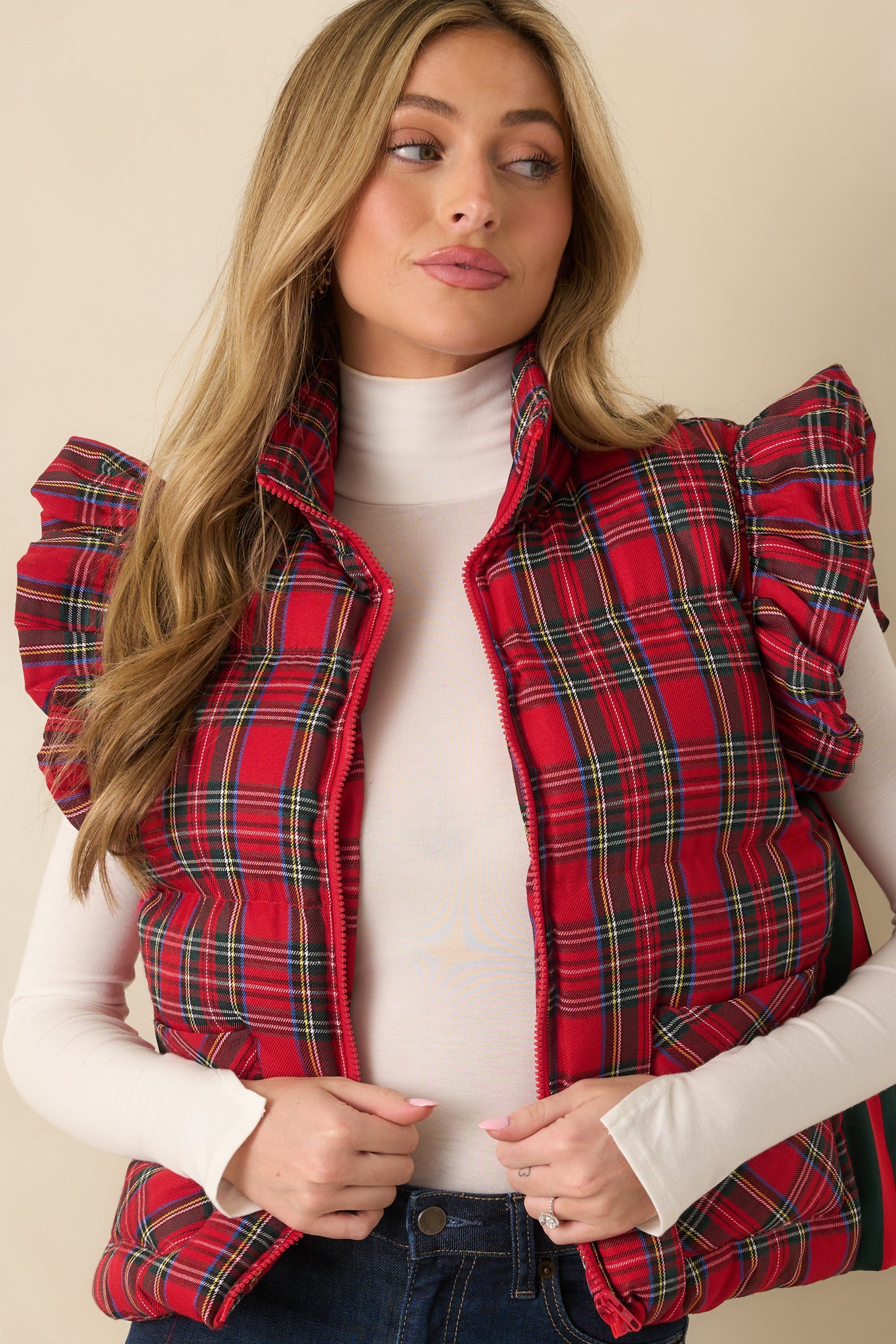 Red plaid puffer vest featuring the ruffle-trim detail along the shoulders.
