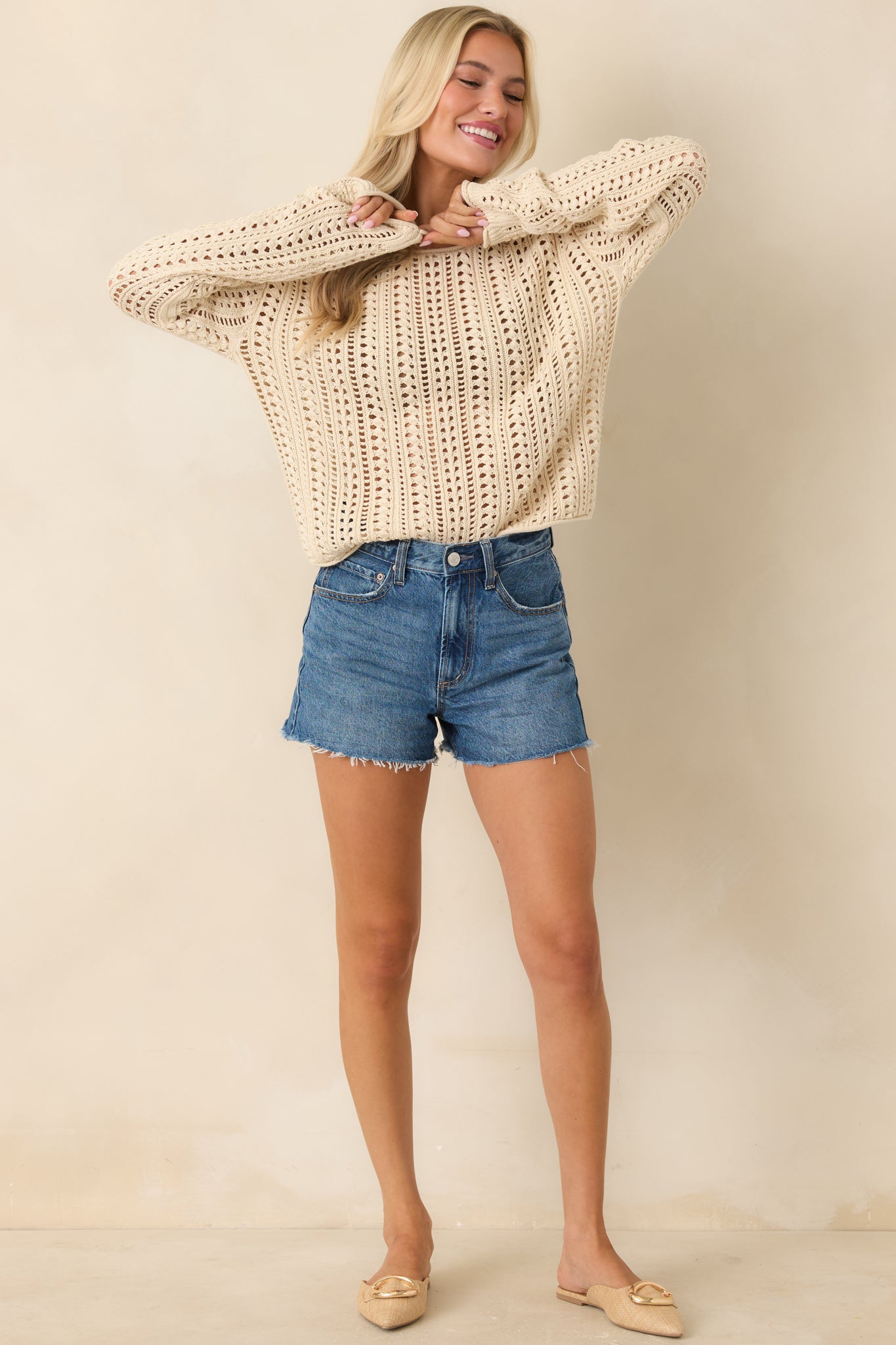 Relaxed beige sweater top with breathable crochet knit and vertical pattern detail.