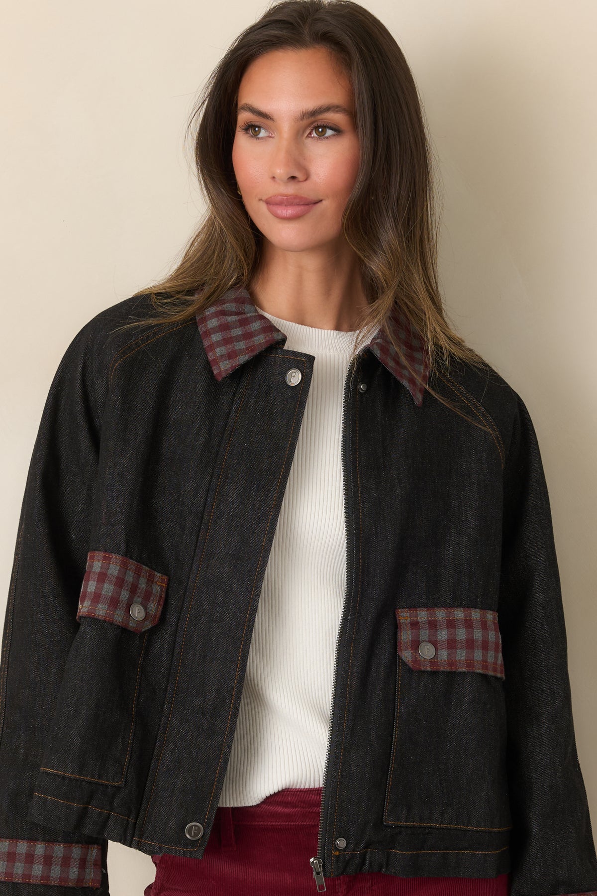 Relaxed boxy jacket displaying the retro denim design, gingham trim, and roomy front pockets.
