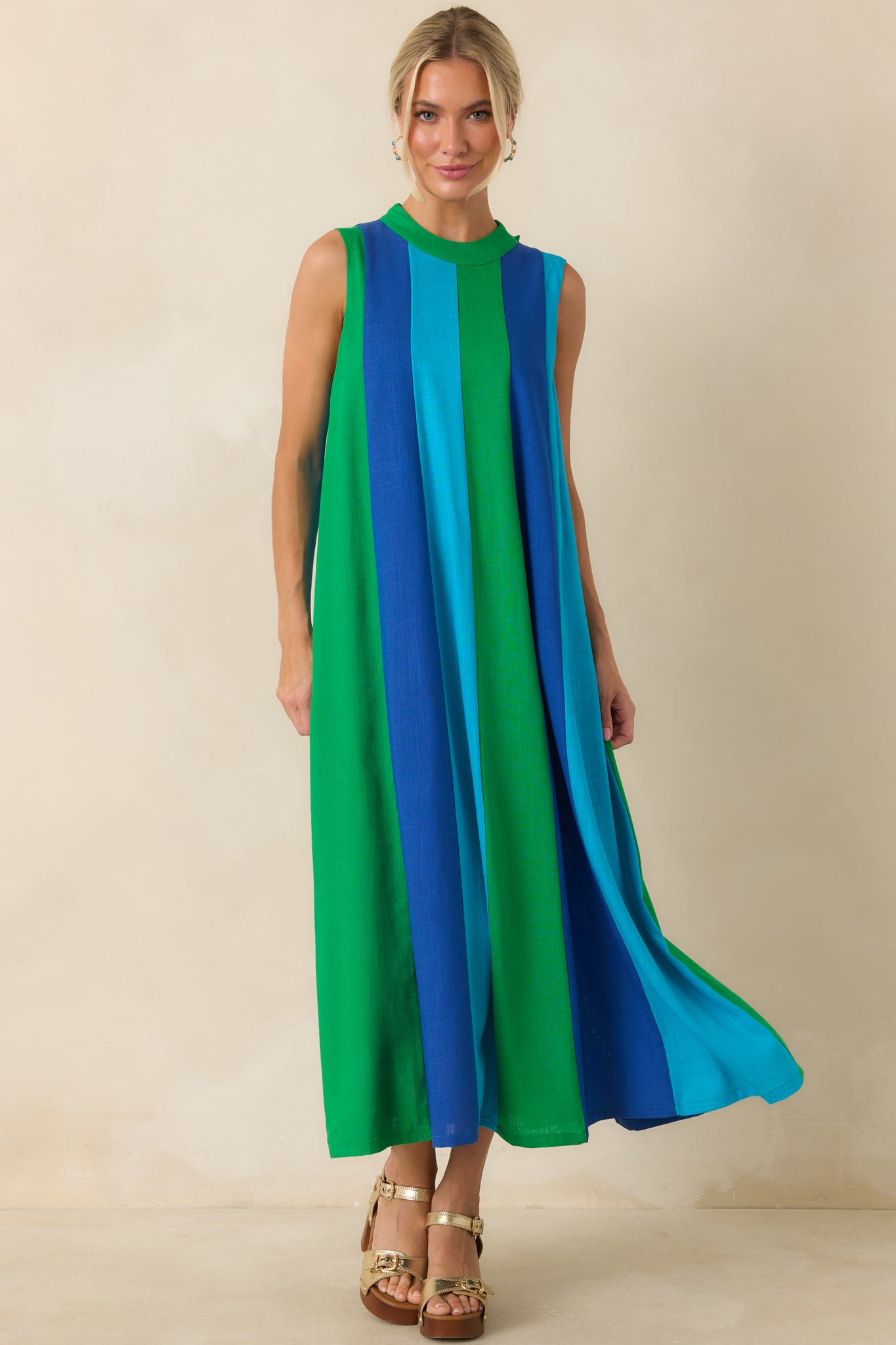 Relaxed-fit midi dress highlighting vibrant colorblock detailing and an airy sleeveless silhouette.