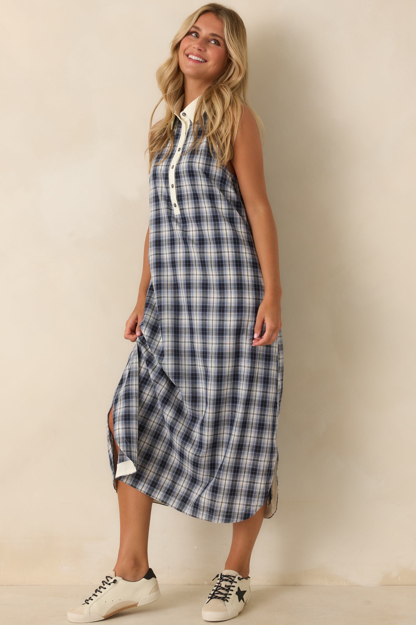 Breathable cotton dress with a relaxed silhouette, contrasting ivory accents, button-front detail, and timeless styling.