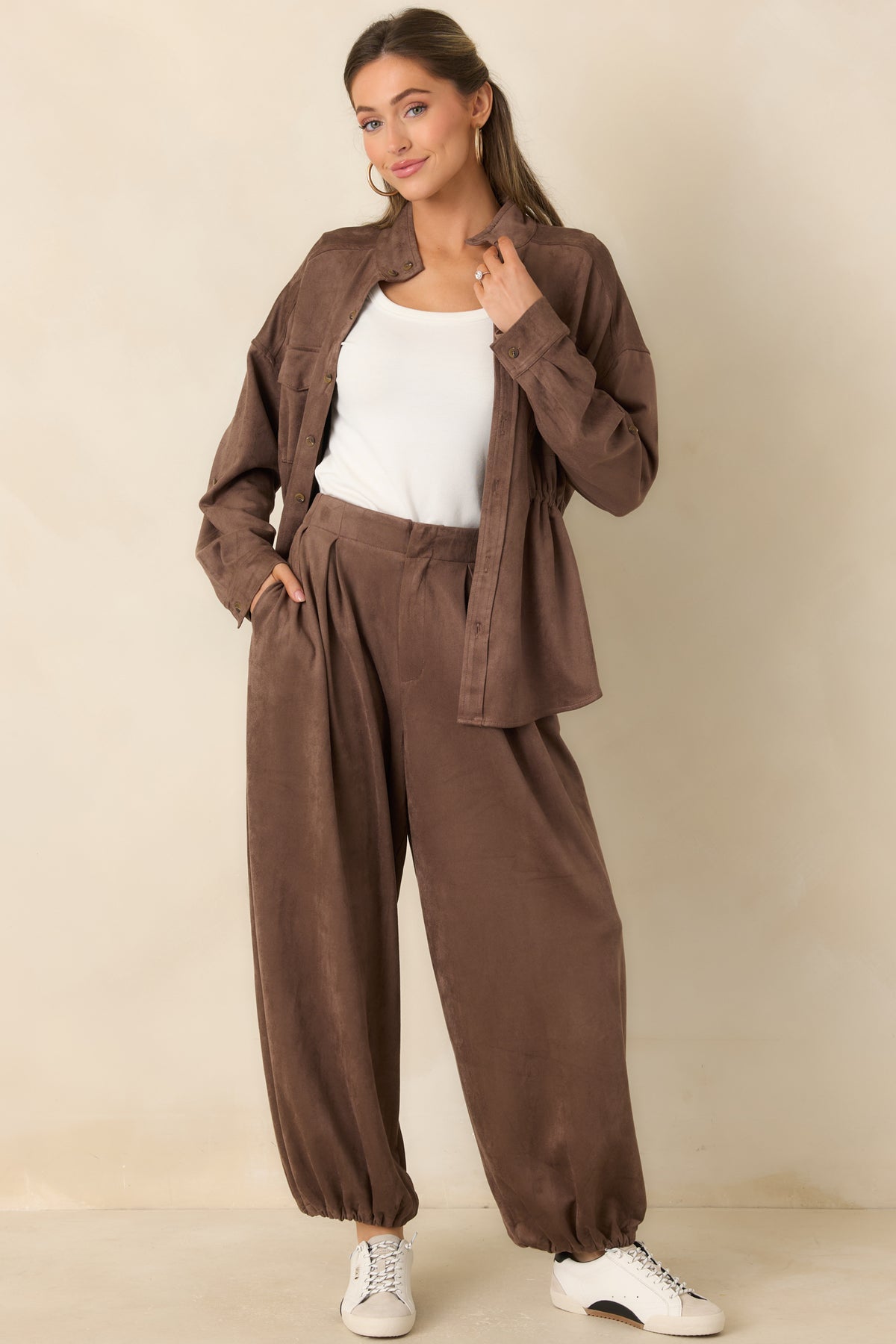 Relaxed faux suede pants with roomy rounded legs and a smooth flat waistband.